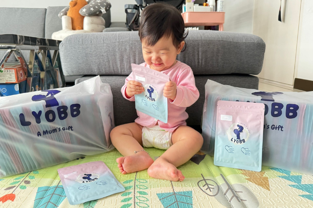 Mother using LyoBB freeze-dried breastmilk service in Singapore