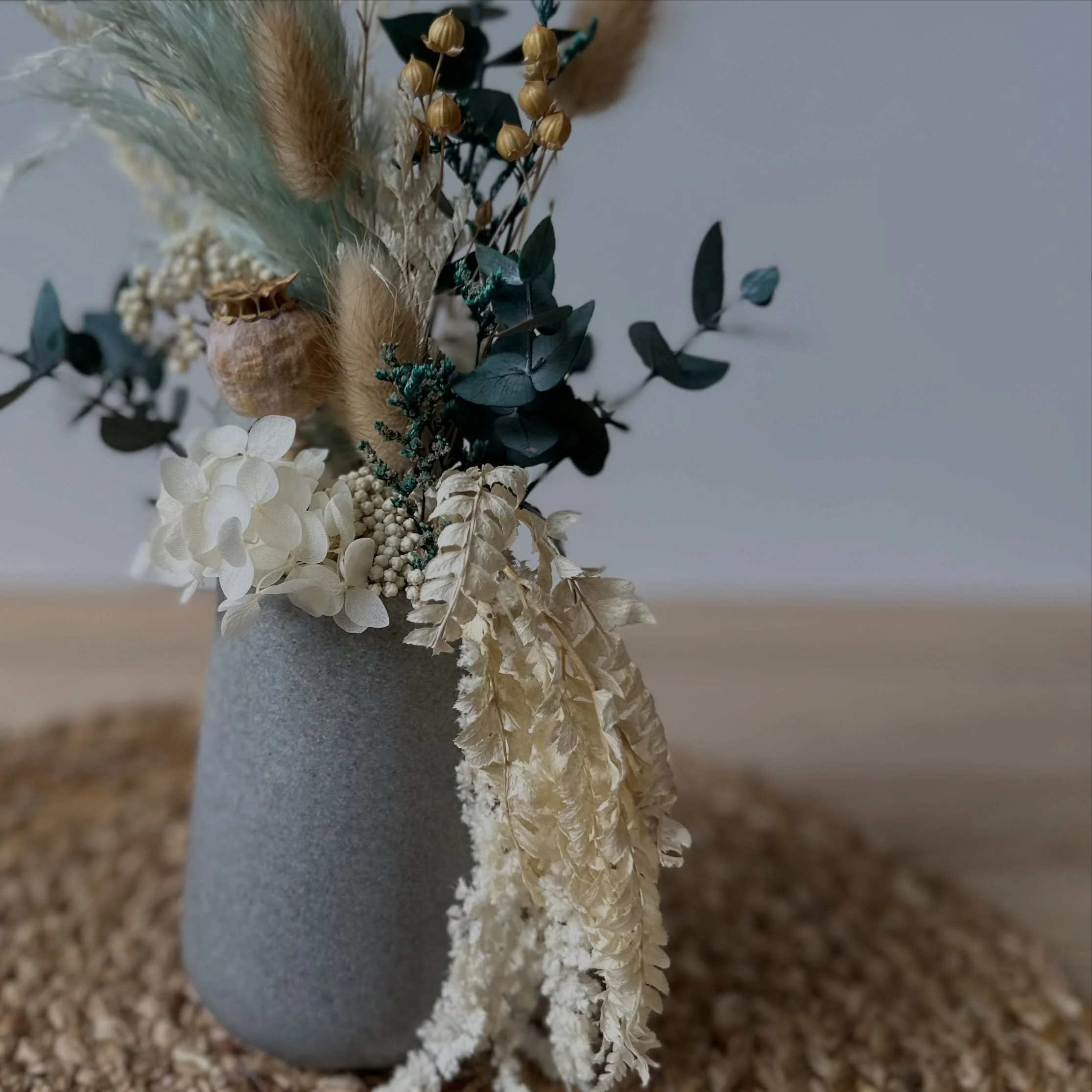 These gorgeous marble vessels are perfect for our new mint and neutral arrangements. They are tall, slim, and look elegant without taking up too much space. Best of all, they are preserved so they need zero maintenance. A total win-win!