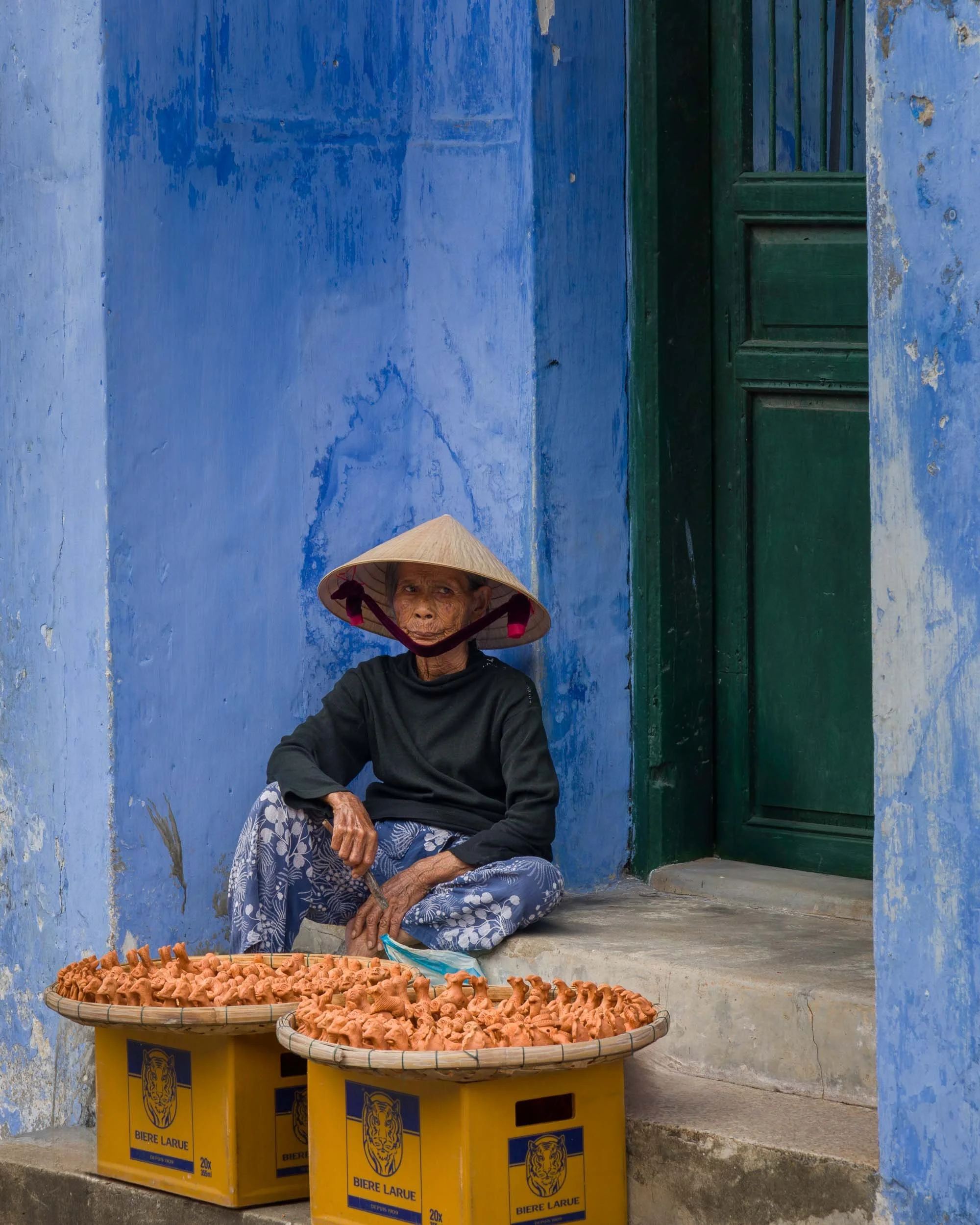Terracotta whistle seller, in Hoi An