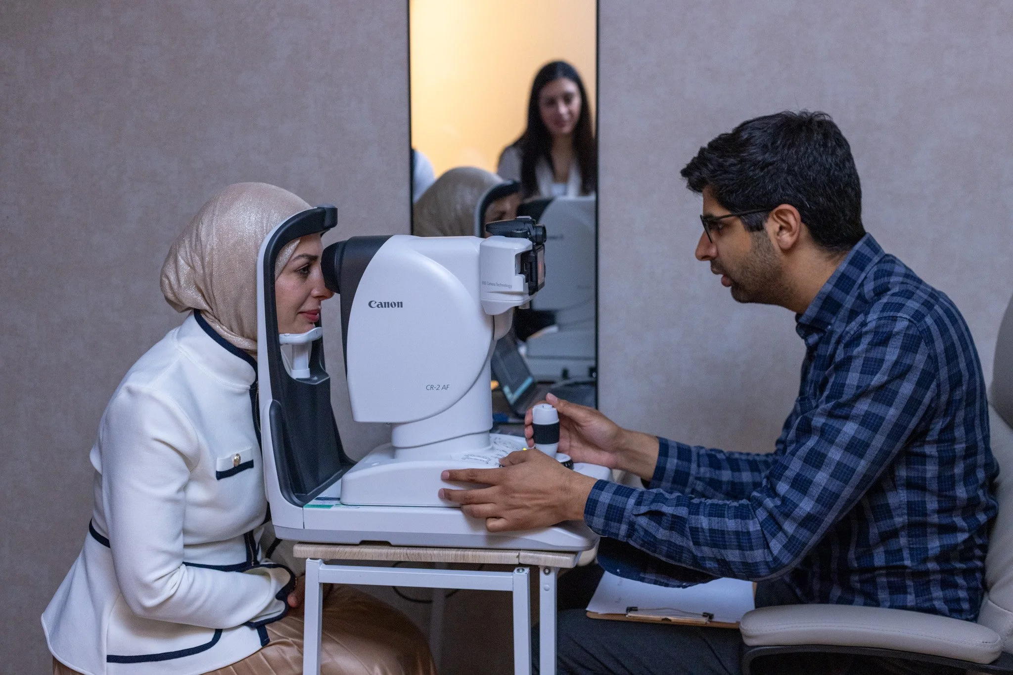 Doctor giving a patient an eye exam