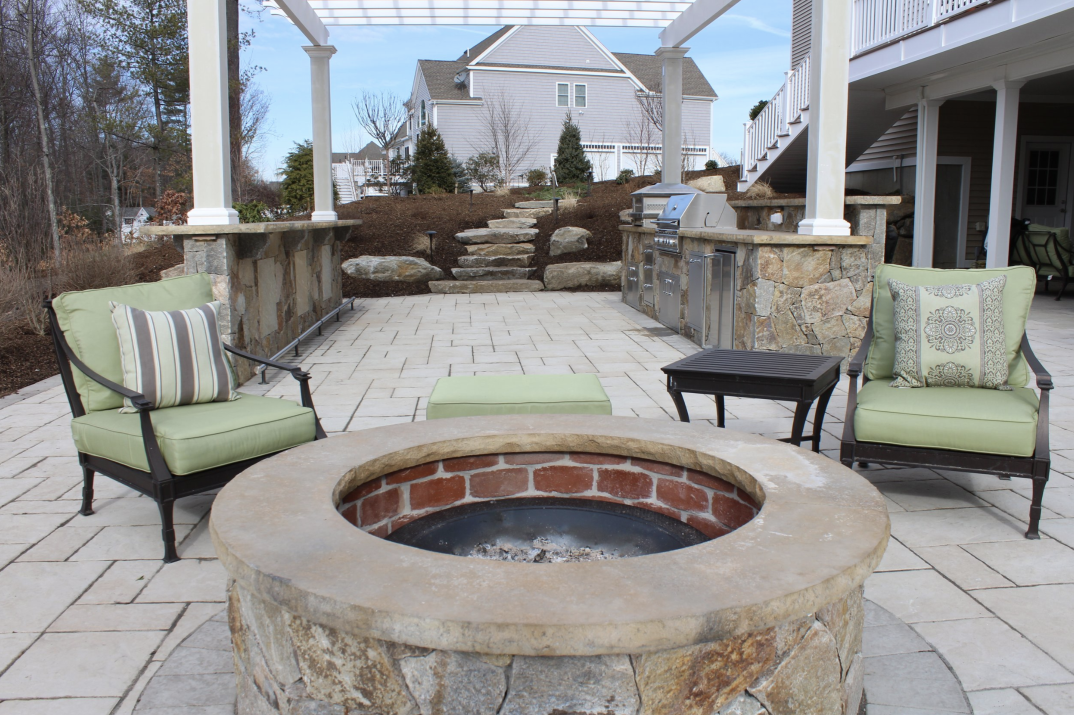 We are proud to help homeowners throughout Hopkinton, Sherborn, Dover, Wellesley, Medfield, and across Massachusetts create stunning outdoor patios, custom patio fire pits, and personalized patio designs. As trusted outdoor patio contractors, we spec