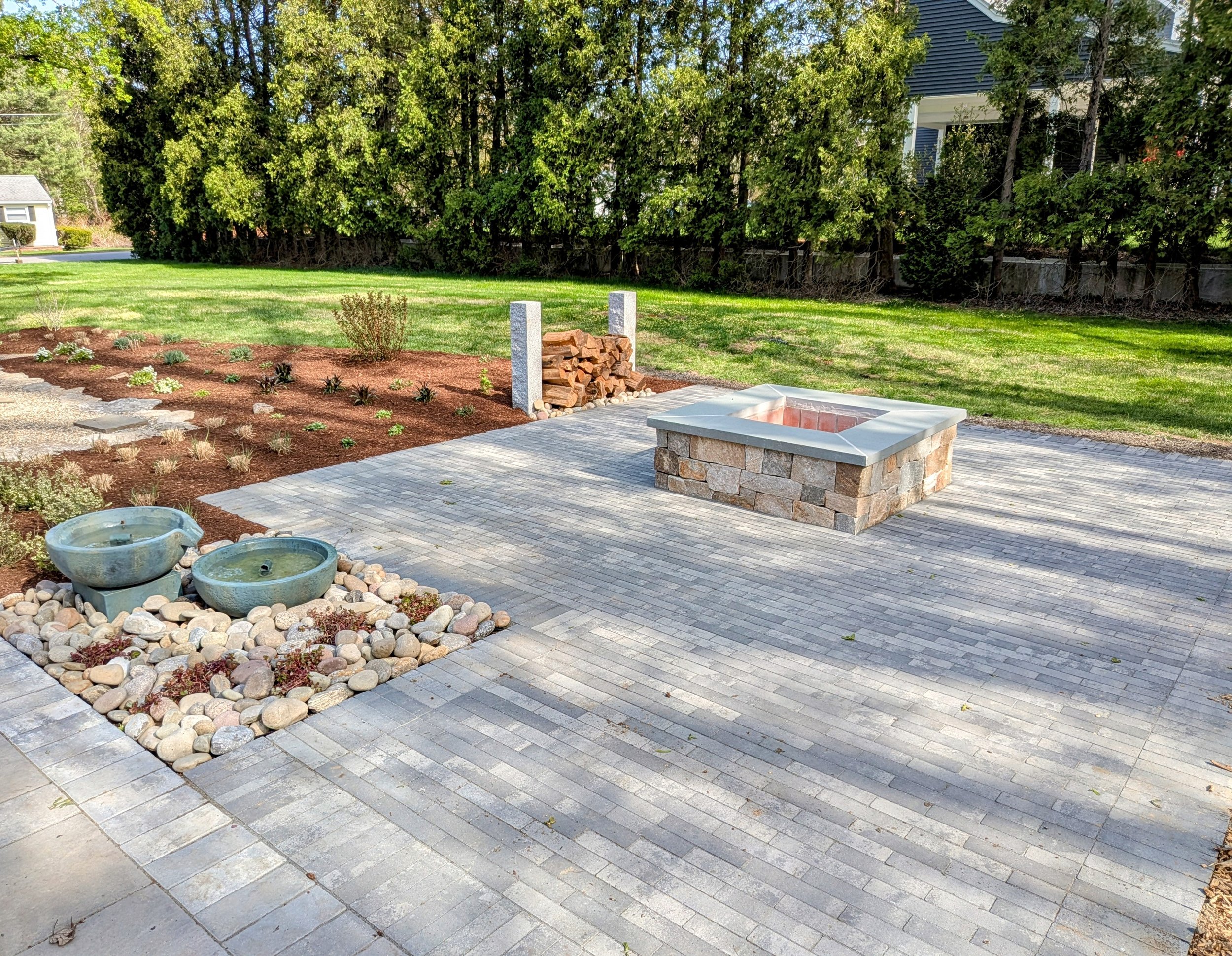 We are proud to help homeowners throughout Hopkinton, Sherborn, Dover, Wellesley, Medfield, and across Massachusetts create stunning outdoor patios, custom patio fire pits, and personalized patio designs. As trusted outdoor patio contractors, we spec