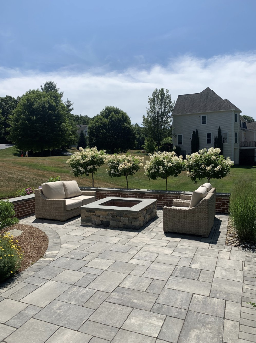 We are proud to help homeowners throughout Hopkinton, Sherborn, Dover, Wellesley, Medfield, and across Massachusetts create stunning outdoor patios, custom patio fire pits, and personalized patio designs. As trusted outdoor patio contractors, we spec