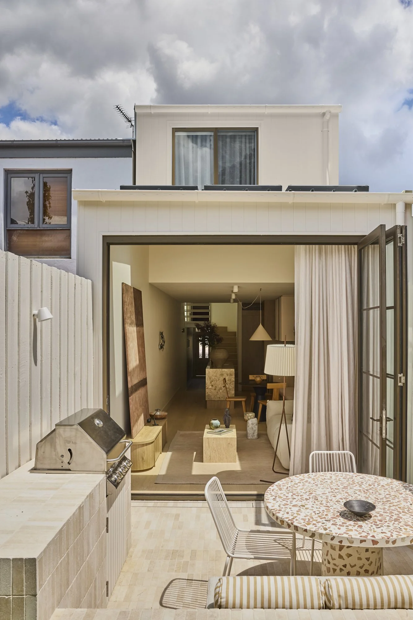 Open rear façade of a restored heritage terrace in Sydney by leading Balmain architect Passer Architects.