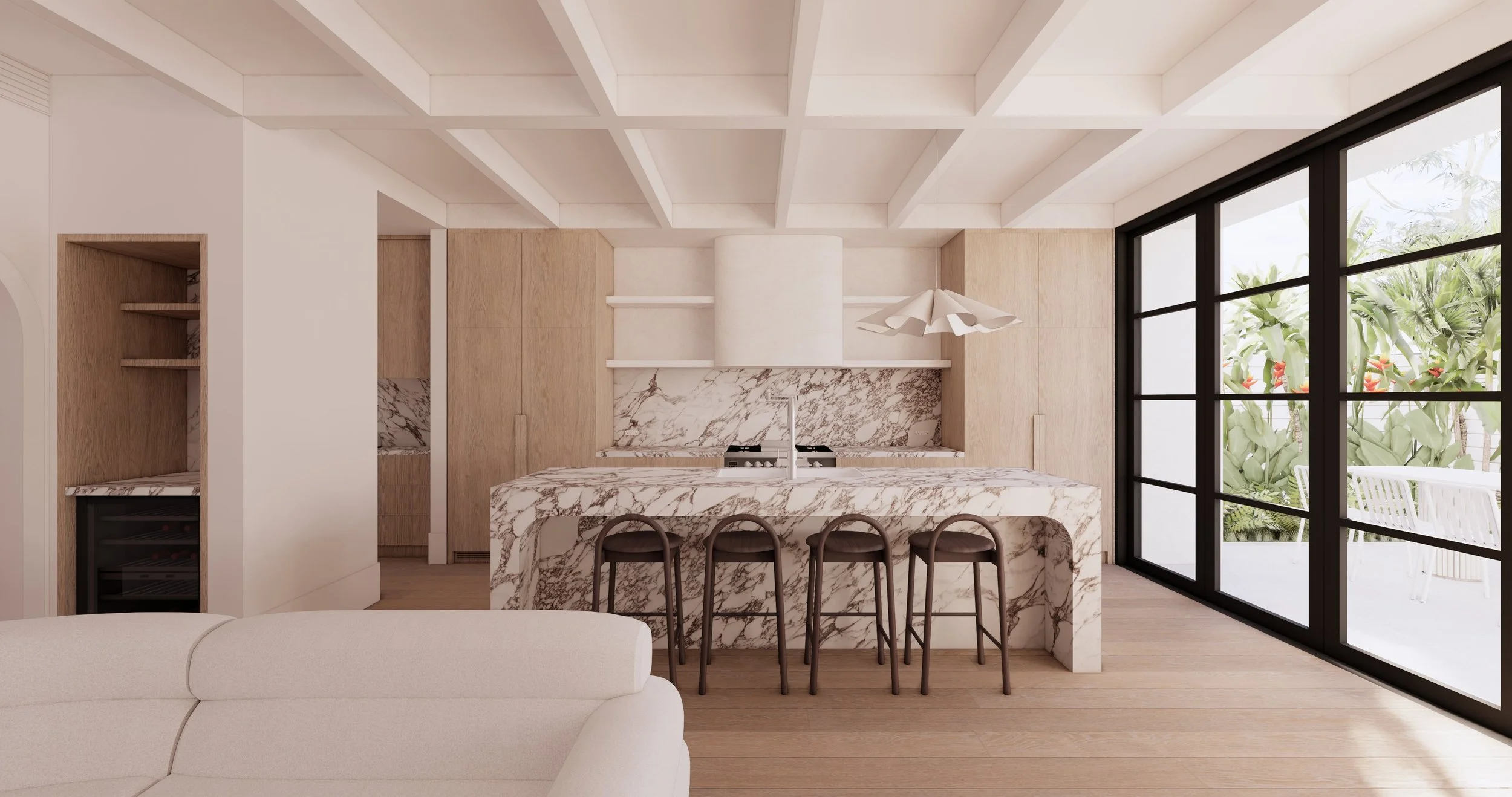 Open plan kitchen with marble island, timber joinery and connection to outdoor garden