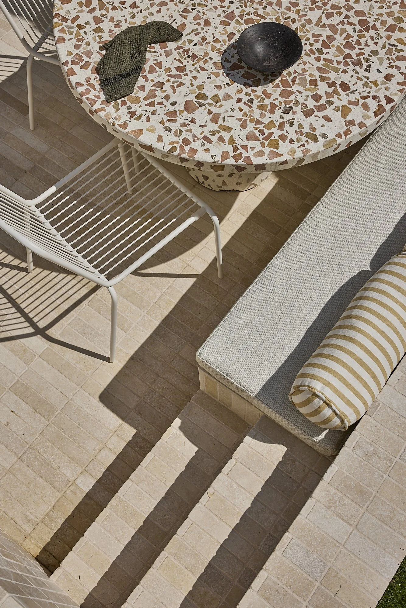 Terrazzo dining table and built in bench seating within a refined heritage terrace renovation in Balmain, Sydney.