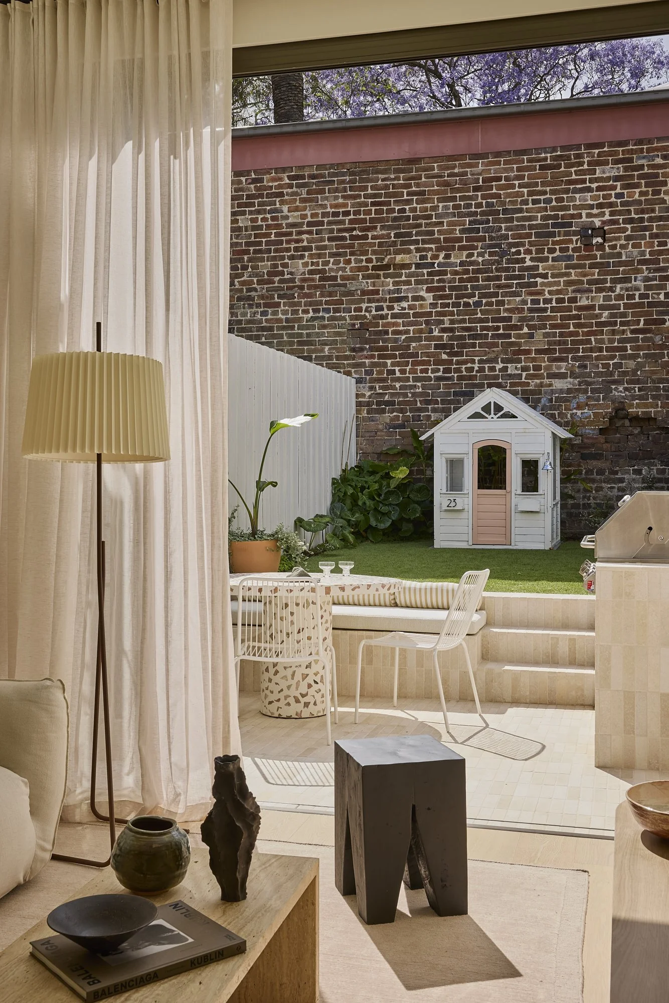 Rear courtyard and indoor outdoor living in a heritage terrace renovation in Sydney by Balmain architect Passer Architects.