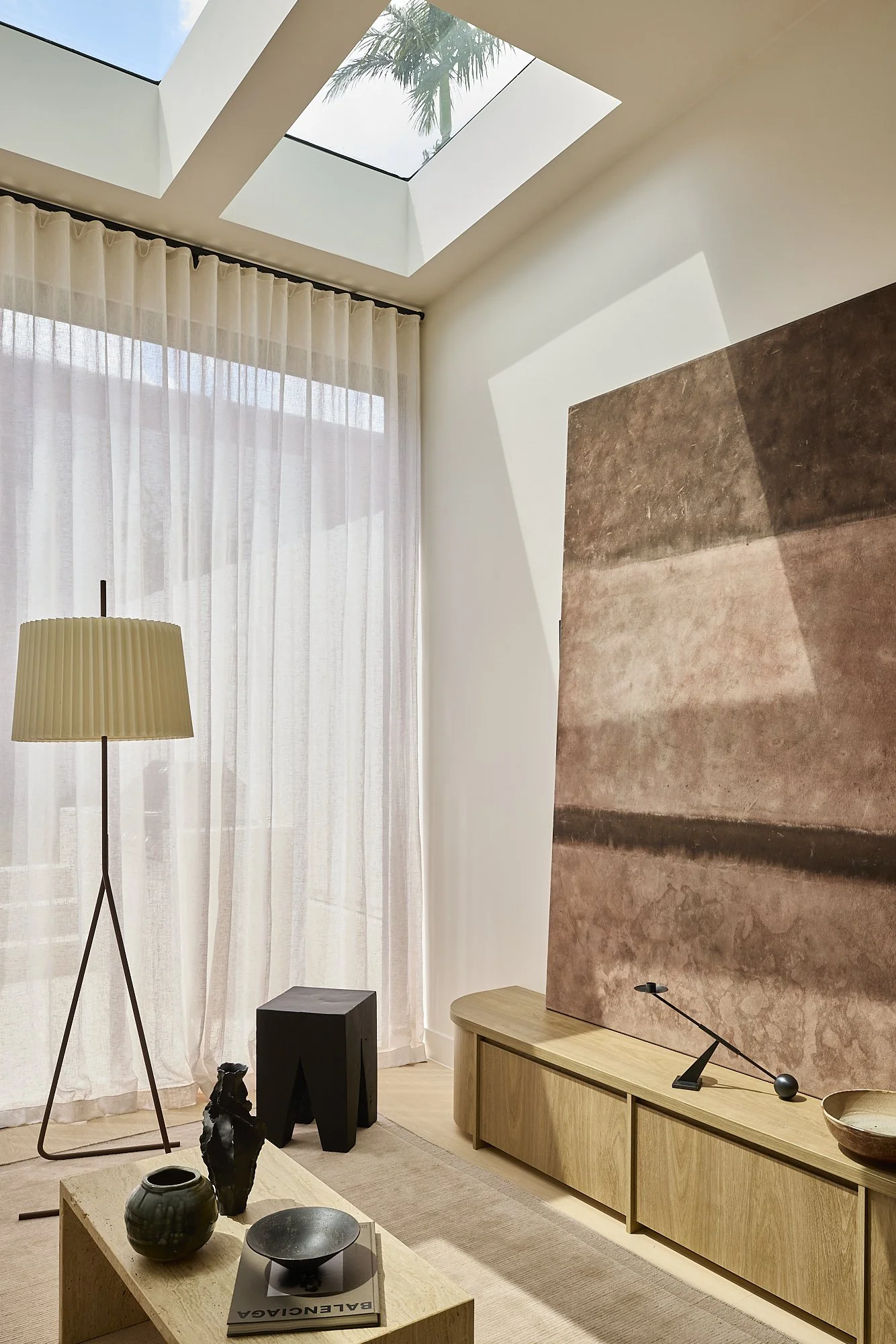 Soft linen curtains and warm natural light in a restored Balmain terrace by Passer Architects.