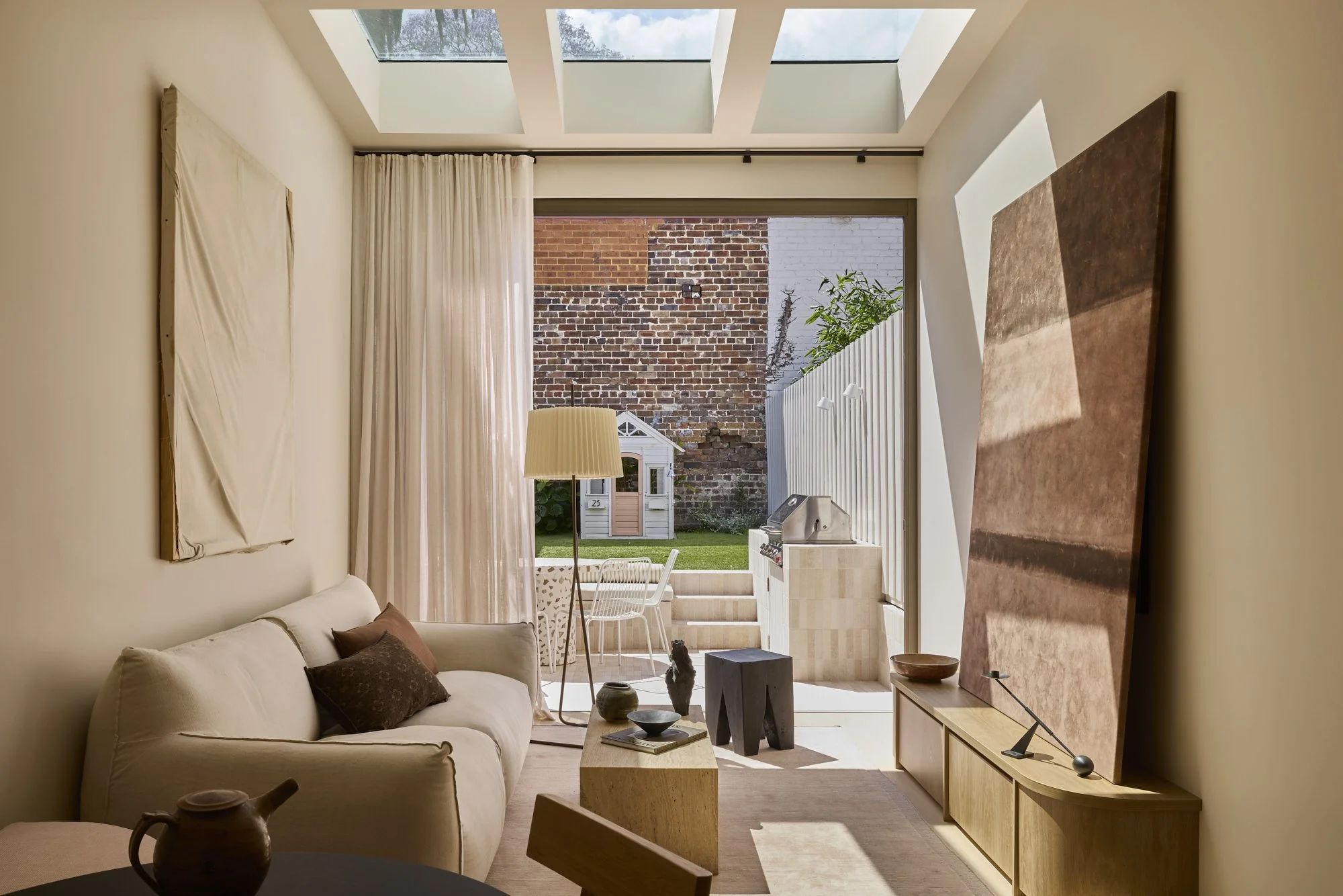 Open plan living and dining in a narrow heritage terrace renovation in Balmain, Sydney.