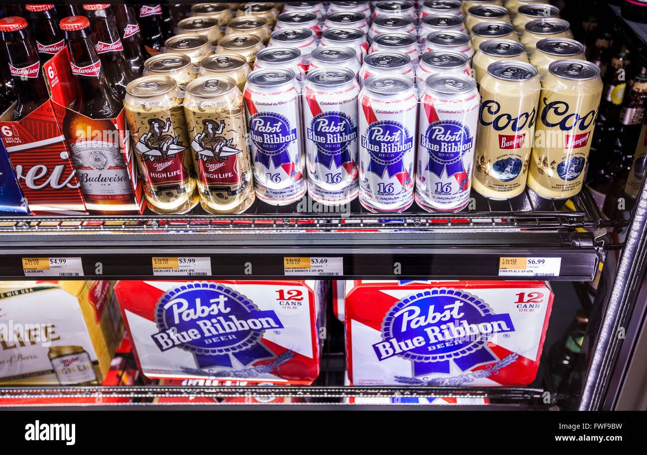 shelves-of-six-pack-american-made-domestic-beer-in-the-refrigerator-FWF9BW.jpg
