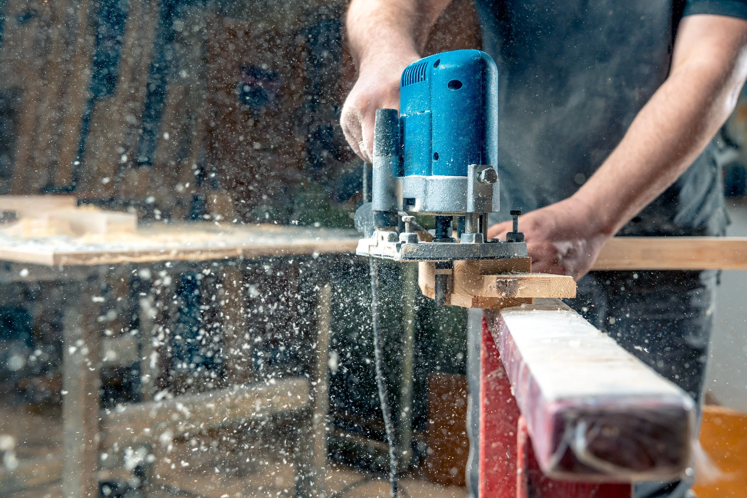 milling-wood-joinery-using-manual-mechanical-cutters-flying-sawdust-air-copy-space.jpg