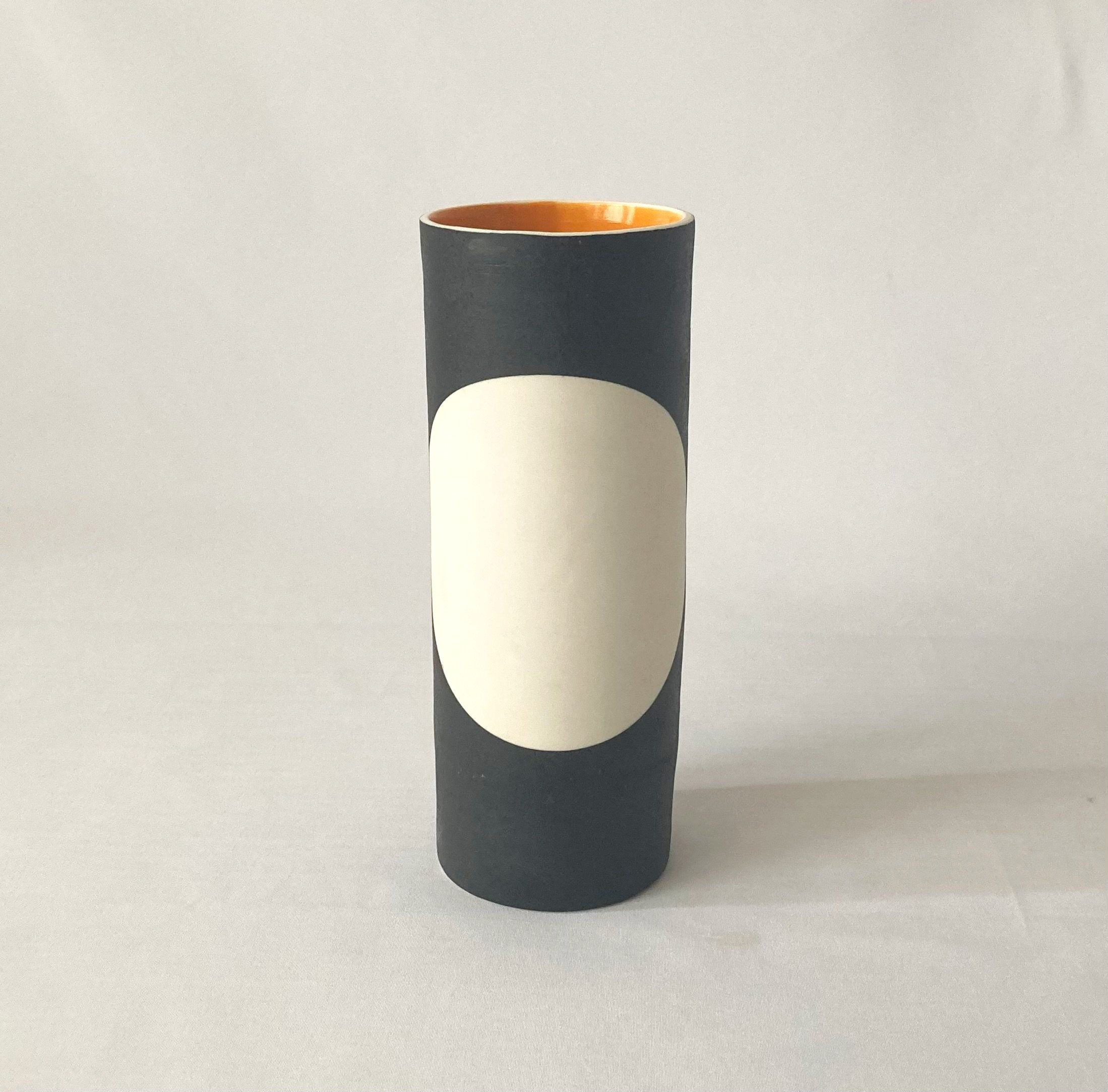 Jill+Tattersall+frot+view+of+1+spot+black+white+and+orange+cylinder+vase.jpg