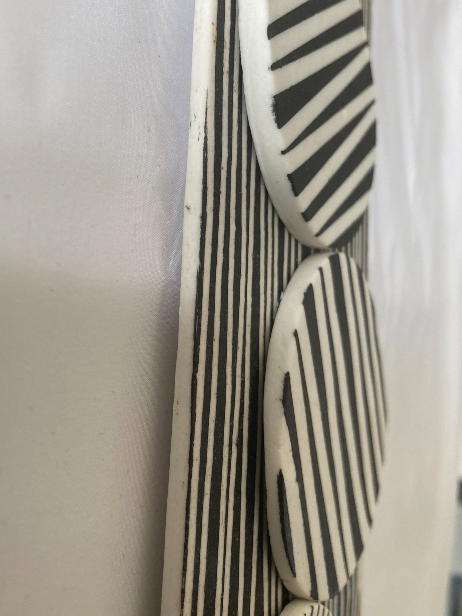 Jill+Tattersall+Ceramics+Twist+Wall+Piece+side+viewl.jpg