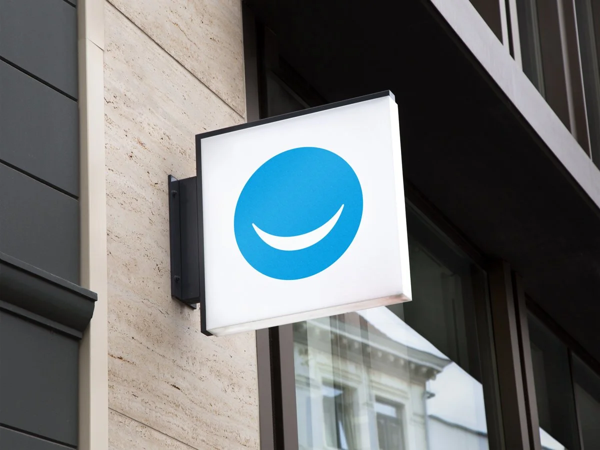 Mockup of logo in use on store street sign