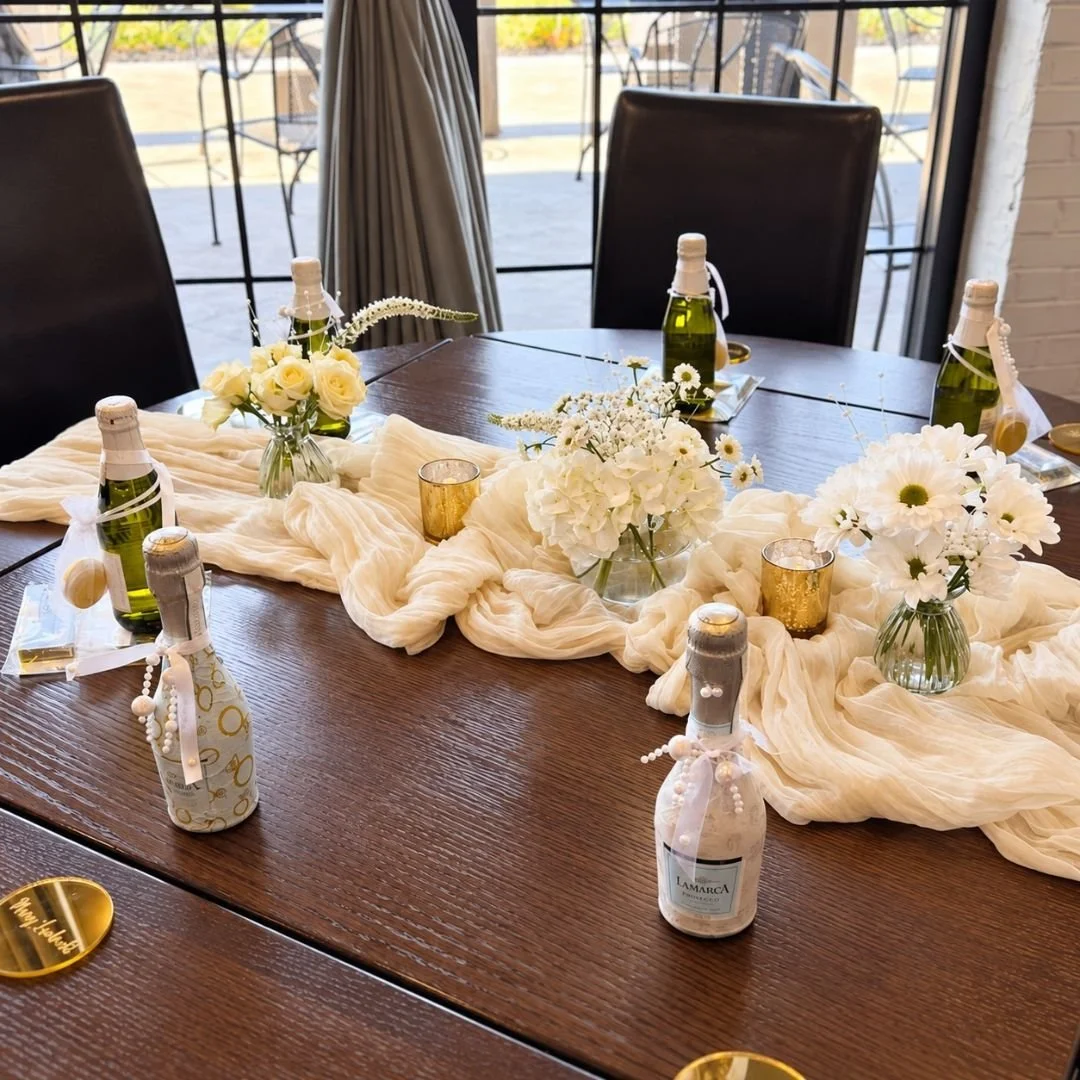 beautiful table decor setup at the Campane party room in Fairport New York for a Pearls and Prosecco themed bridal shower
