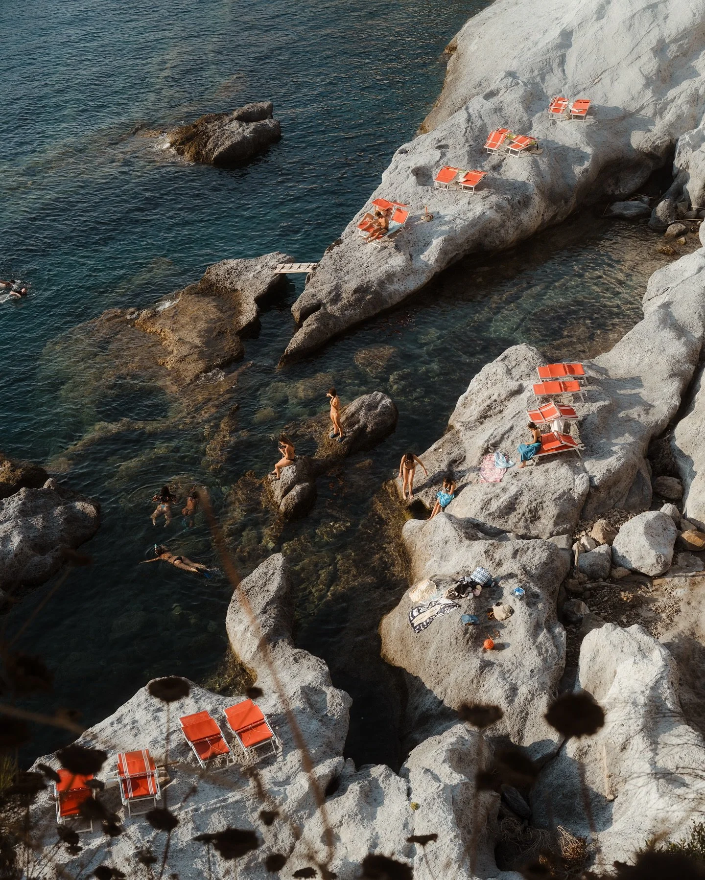 The sea was loud some days, still on others.
One Madonnina watched us from the mountain above, while another was inked across a man&rsquo;s back. Ponza, drenched in golden light 🌞