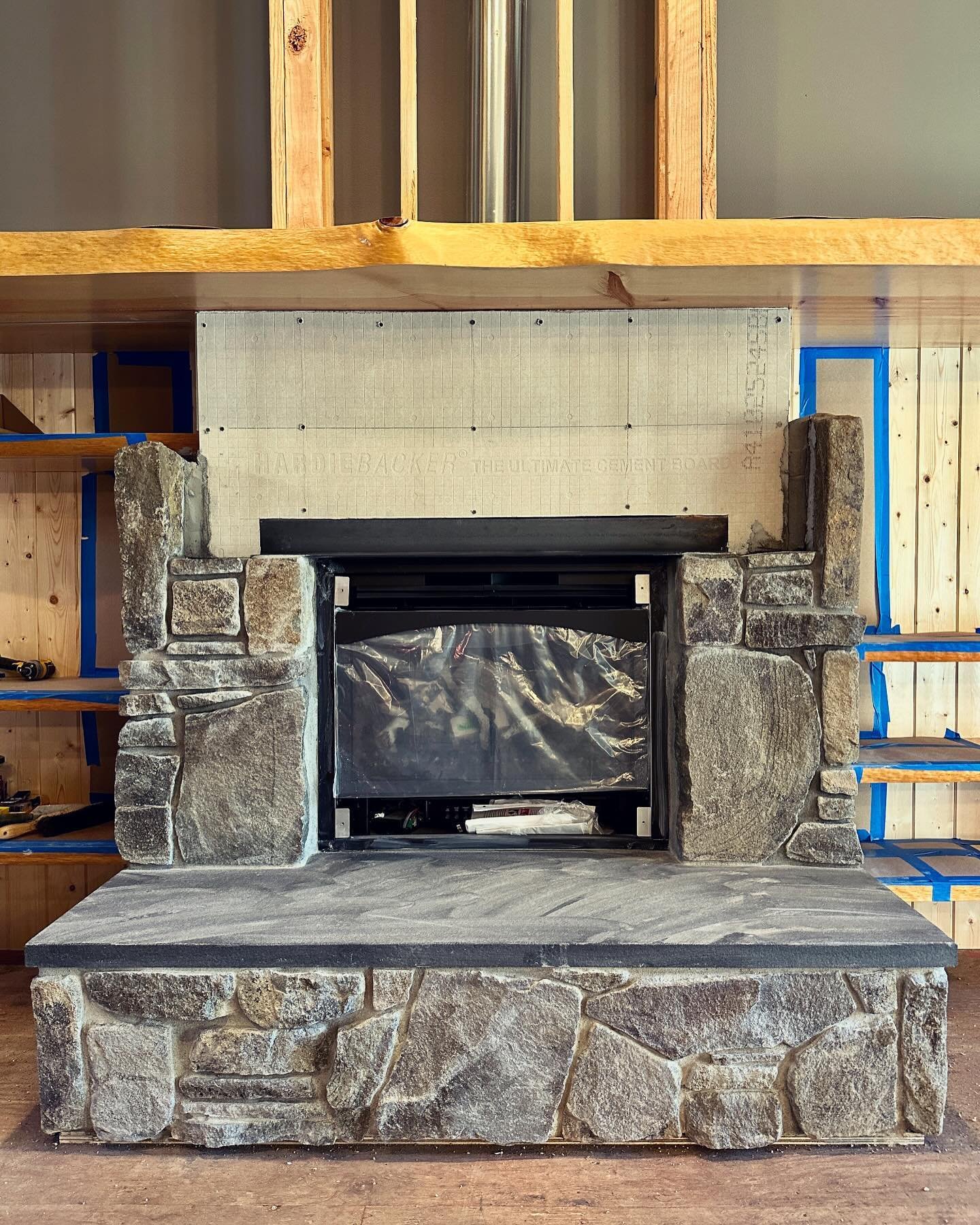 It's starting to look like an actual fireplace #millerstoneworks #stone #stoneart #stonework #stonemasonry #stonemason #naturalstone #drystackstone #design #stonedesign #construction #contractor #masonrycontractor #masonry #stonefireplace #fireplace 