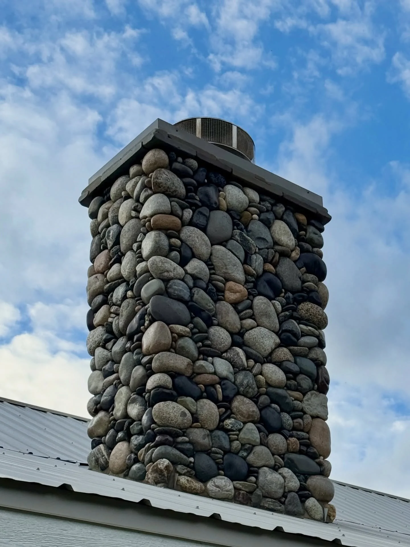 I really like how this chimney turned out, especially the double layer of bluestone to cap it off #millerstoneworks #stone #stoneart #stonework #stonemasonry #stonemason #naturalstone #drystackstone #design #stonedesign #construction #contractor #mas