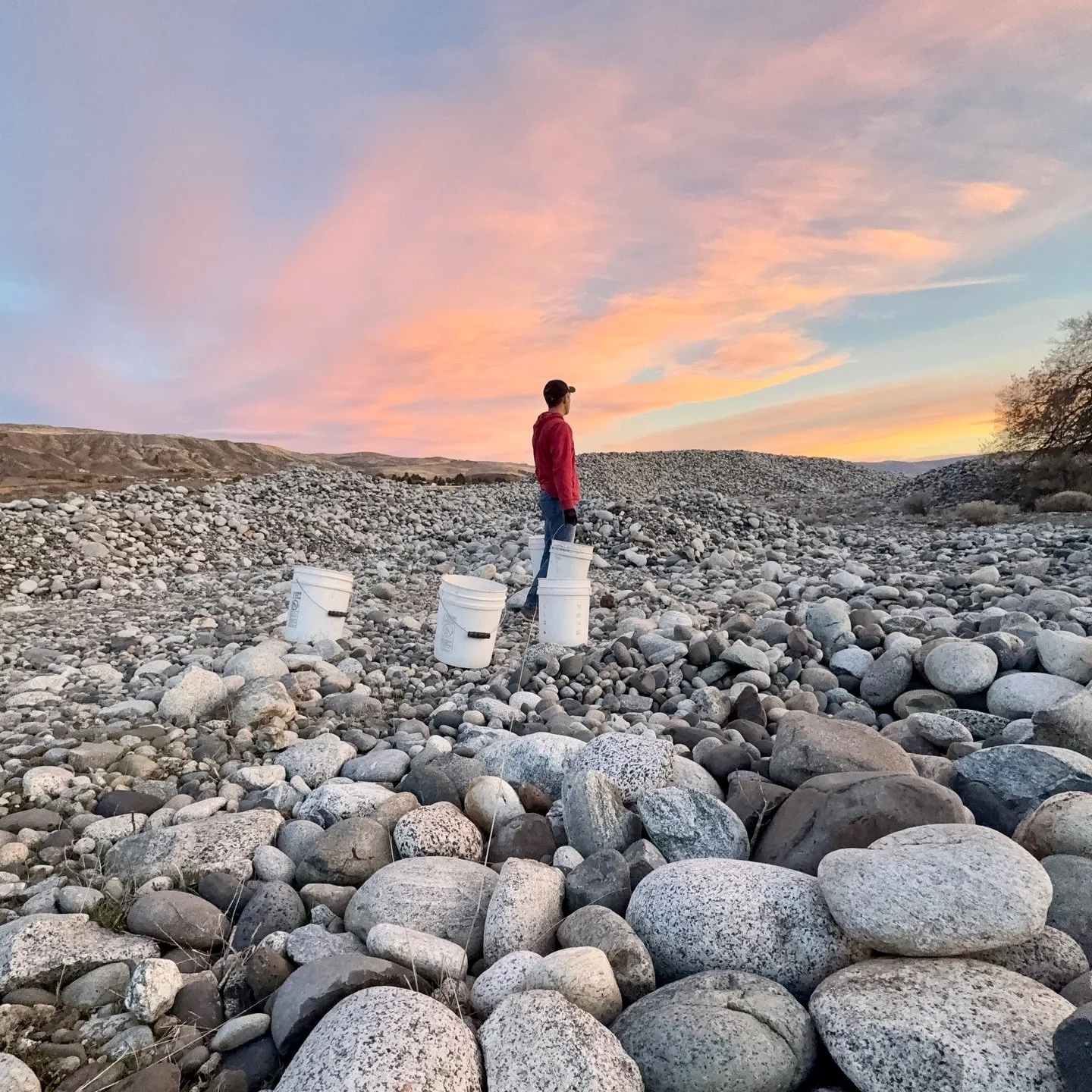 Another one of my favorite pictures from 2025. I hand pick almost all the stone I use. I wish I knew how many five gallon buckets filled with stone I have carried in my lifetime... #millerstoneworks #riverrock #fireplaces #handcollected #stonemason