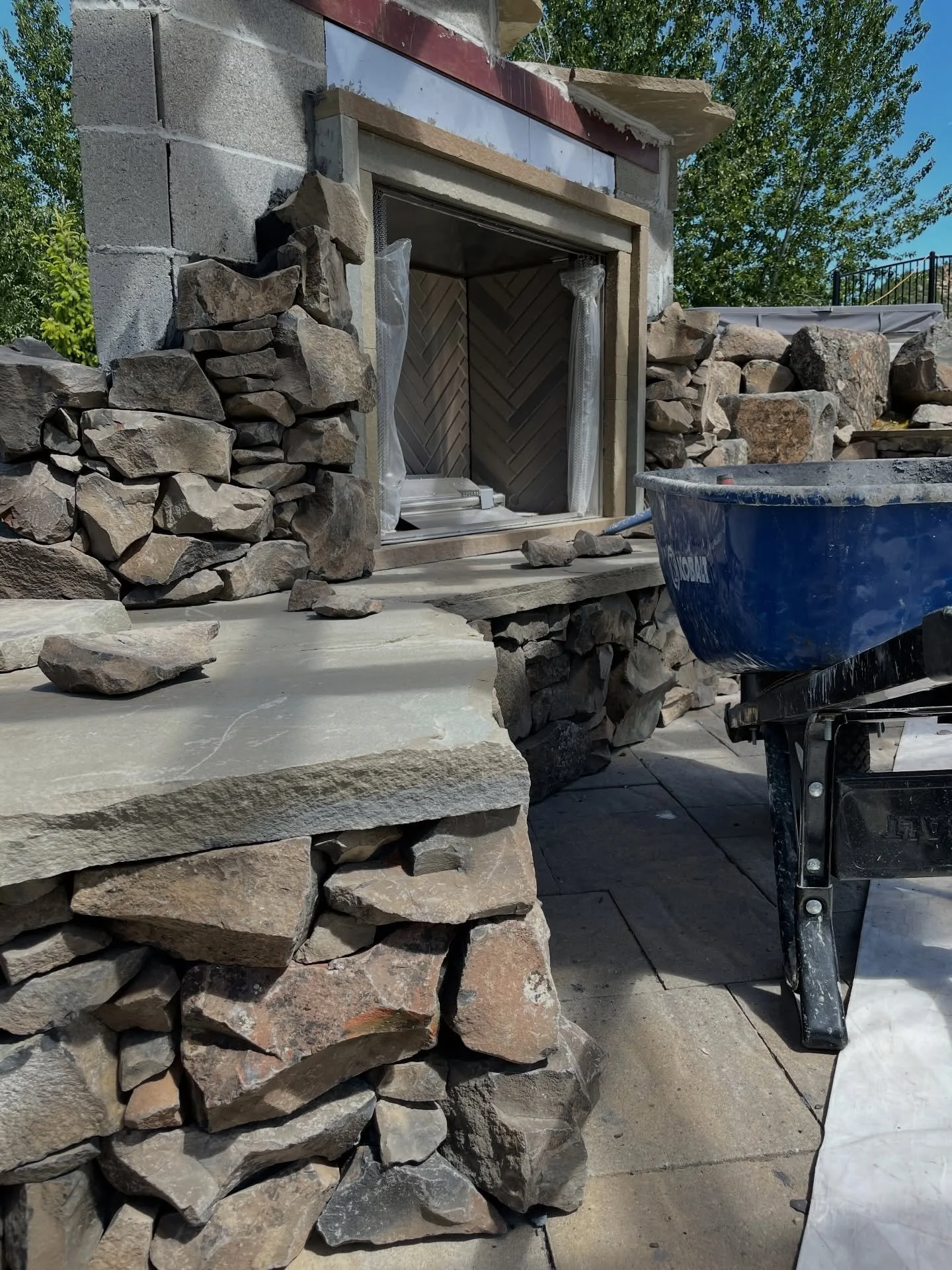 Building with unaltered basalt #millerstoneworks #basalt #fireplace #construction #masonry