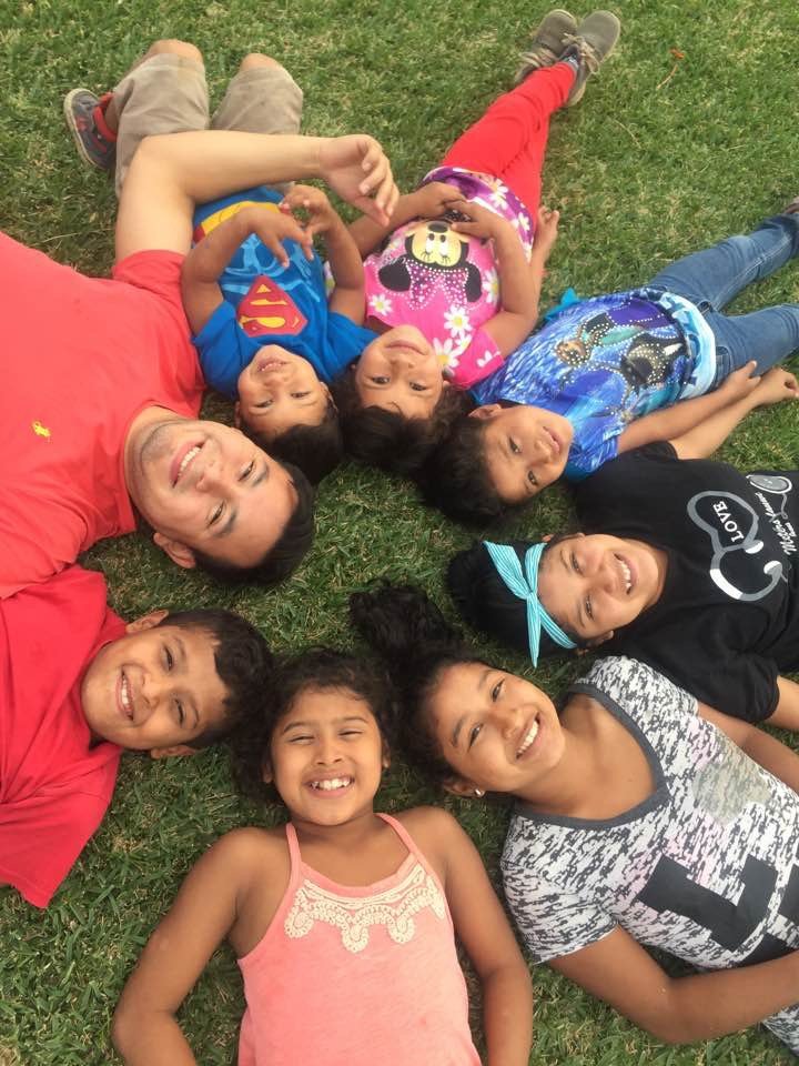 Children on grass in circle