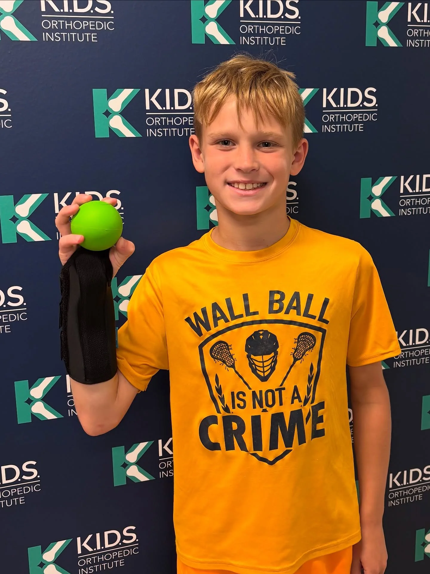 Kicking off back to school photos with our fresh new post-game photo wall! #backtoshool #postgame #saycheese #kidsorthonj #pediatricorthopedics #explorepage