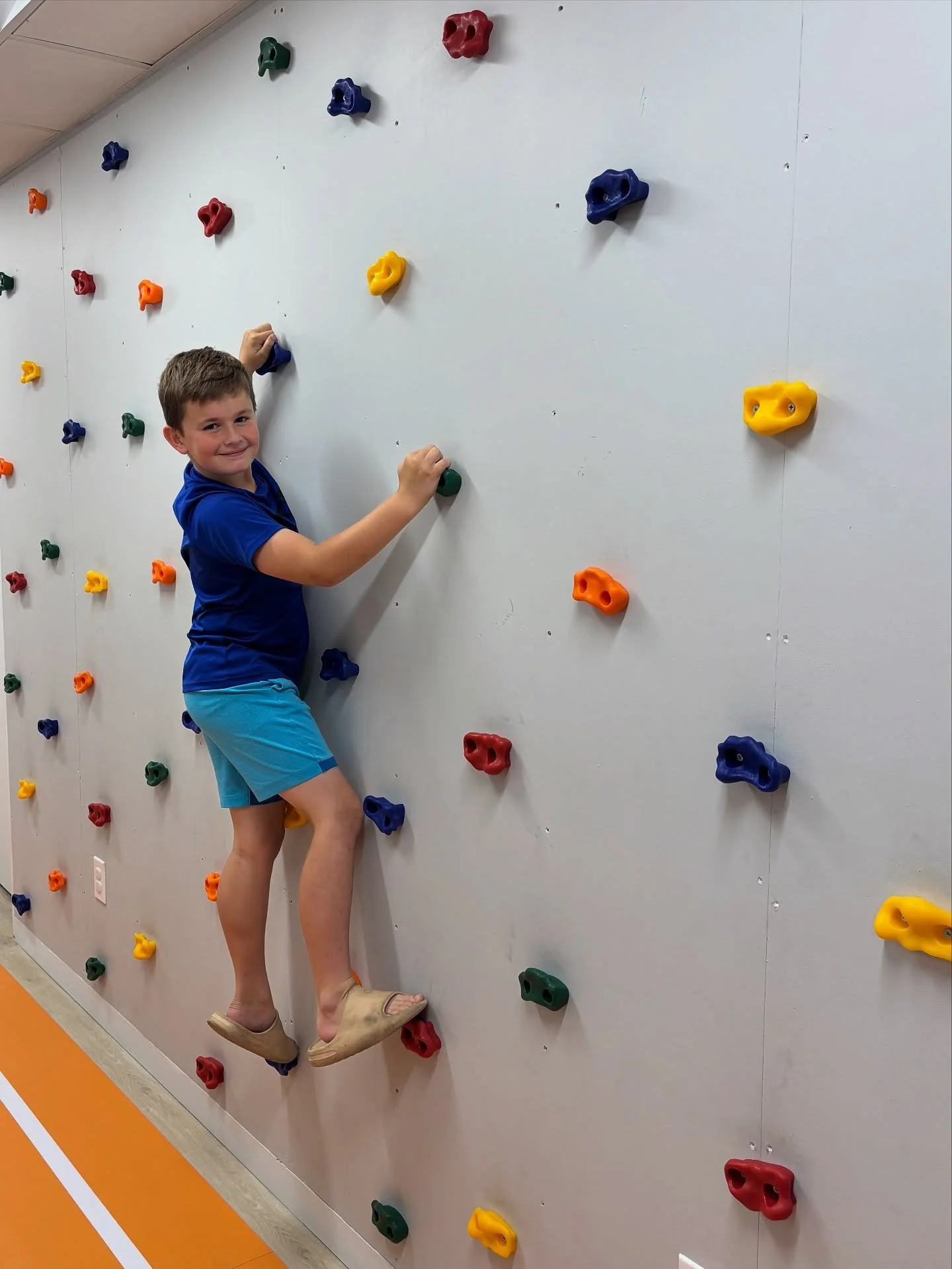 It's a rock-solid favorite! Patients can't get enough of our climbing wall - we're thrilled they're having a blast! #rockwall #doctorsoffice #funisthisway #pediatricorthopedics #tryitout