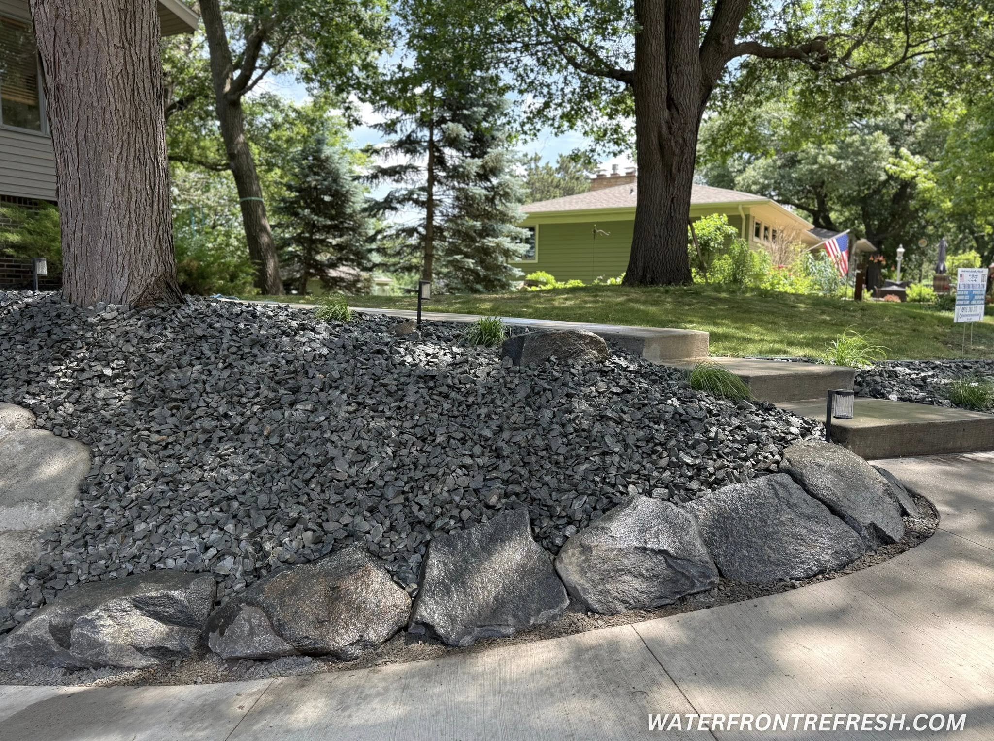 Waterfront Refresh LLC Hudson WI Lake Mallalieu Hudson WI Landscaping Shoreline Experts Steep Slope Hudson WIsconsin Shoreline St Croix River Landscaping Rock Beds Hudson WI St Croix County Landscape Desin Specialists 