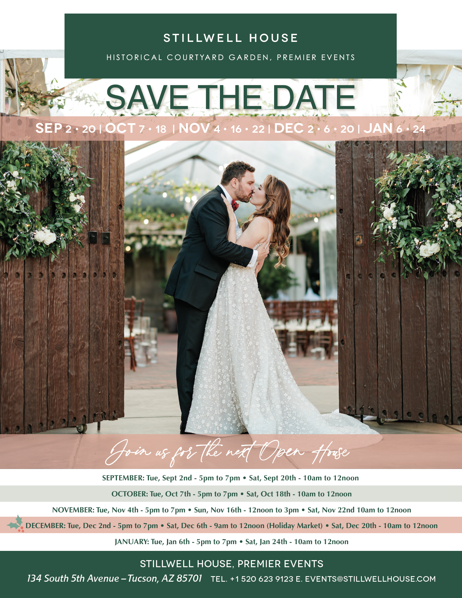 A wedding couple sharing a kiss under a decorated archway at Stillwell House, with floral arrangements and a historic garden setting.