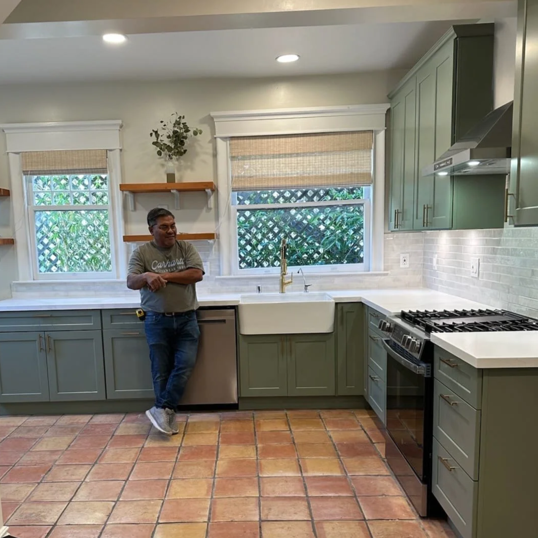 Completed kitchen renovation including full cabinet replacement, quartz countertop installation, plumbing relocation, electrical upgrades for new appliances and lighting, recessed ceiling lights, drywall repair, and interior painting. This remodel mo