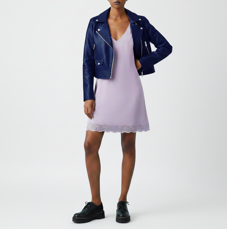 Dramatic Gamine vibrant blue leather jacket paired with Ingenue short flared purple dress and Gamine creepers.