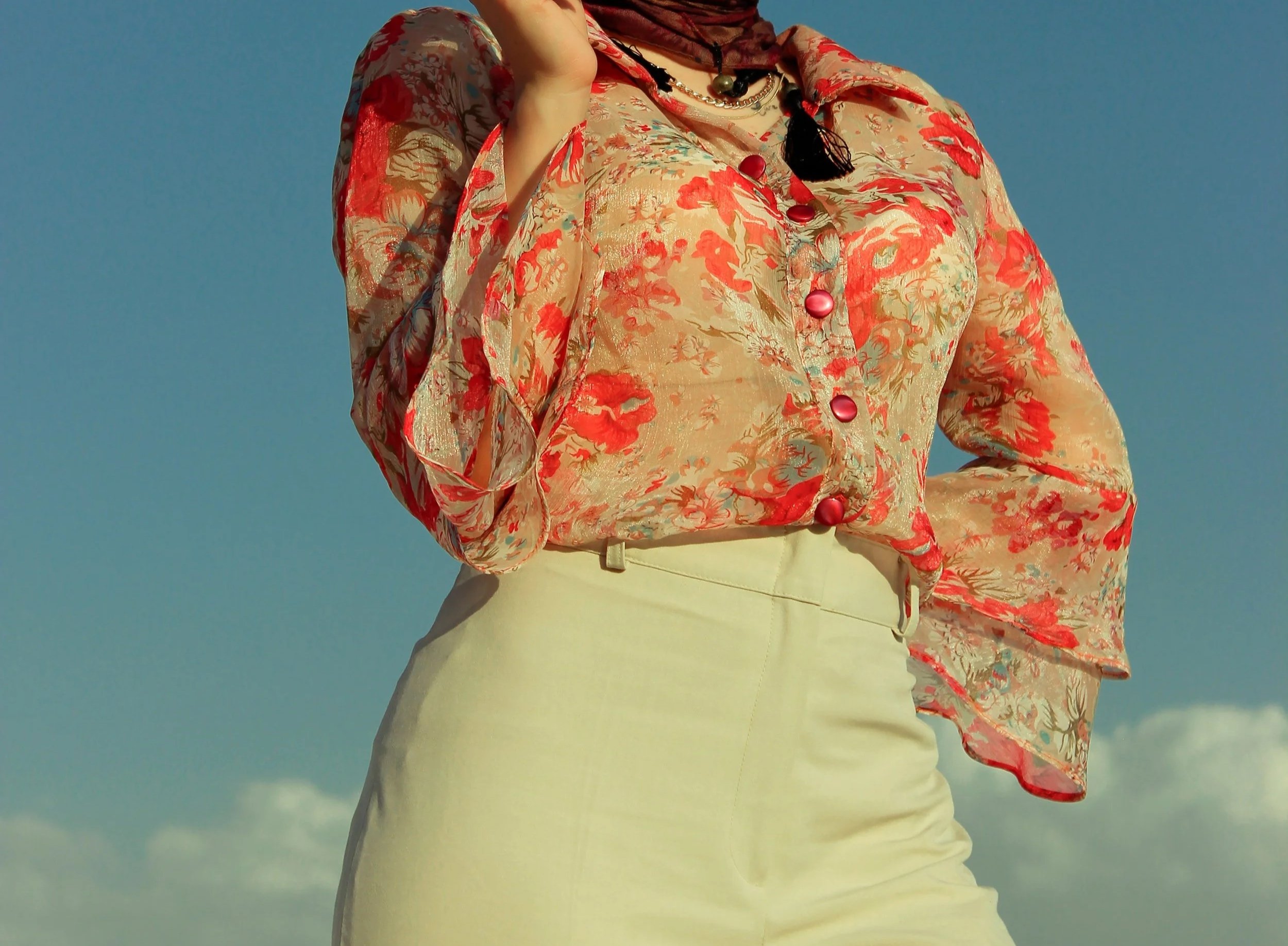 Woman wearing silky watercolor print top