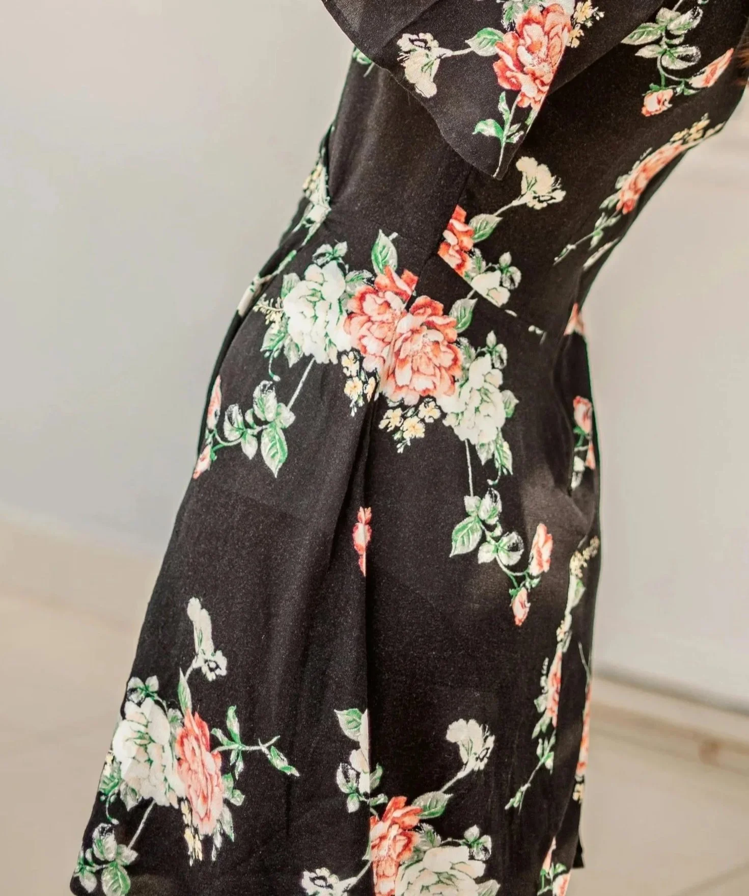 Black dress featuring a large, elaborate peony print