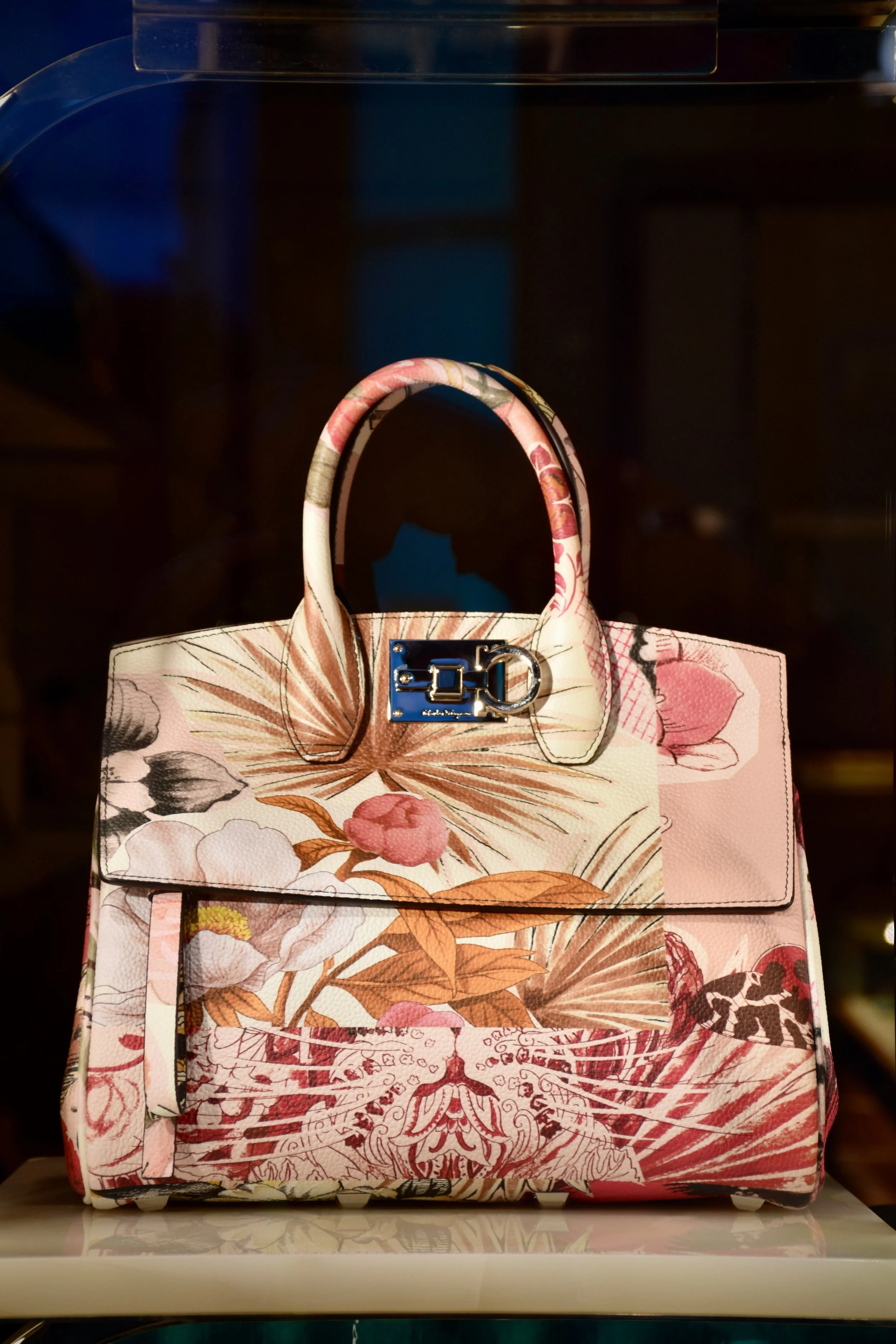 Handbag featuring a dreamy pink, orange, and light neutral color scheme
