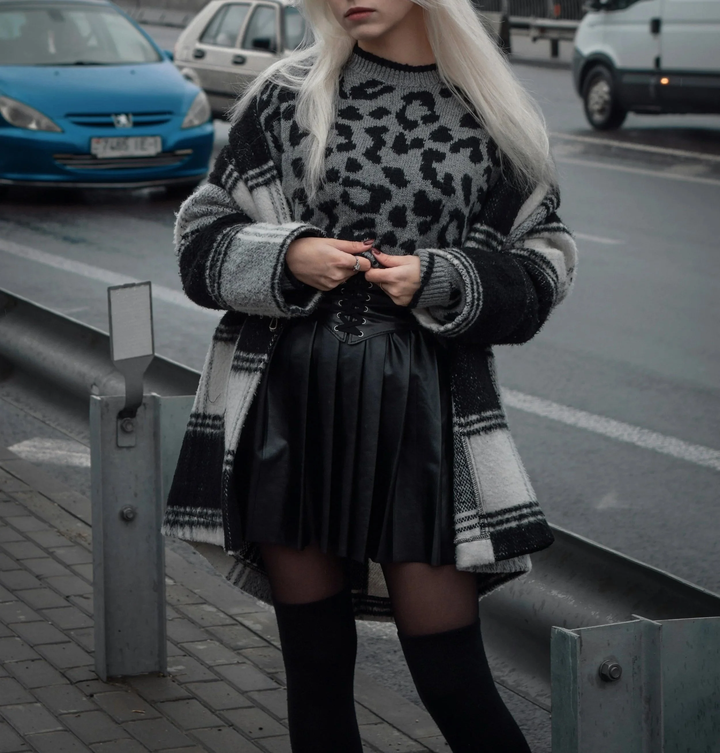 Woman wearing a monochromatic edgy outfit