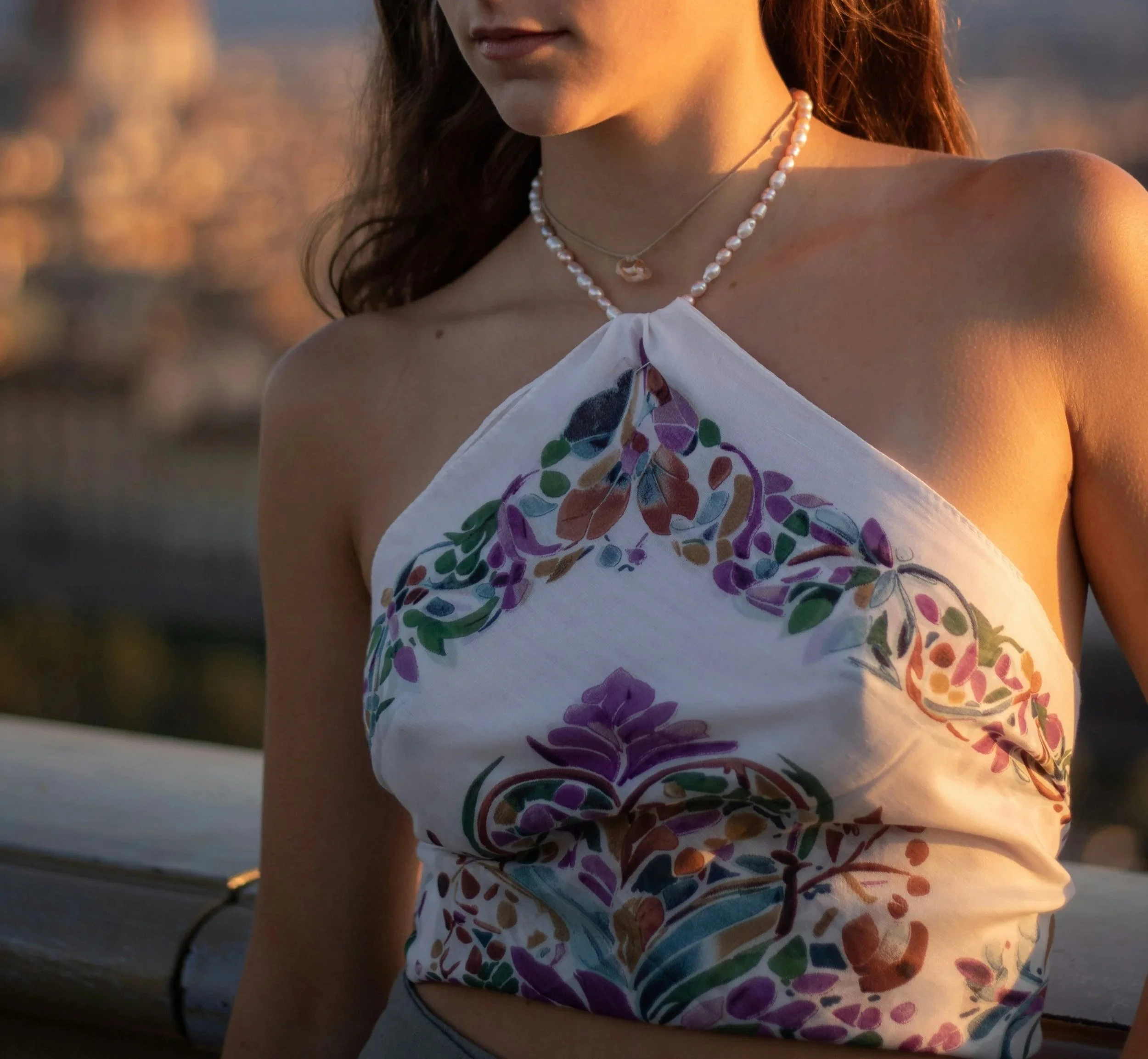 Woman wearing a floral halter top