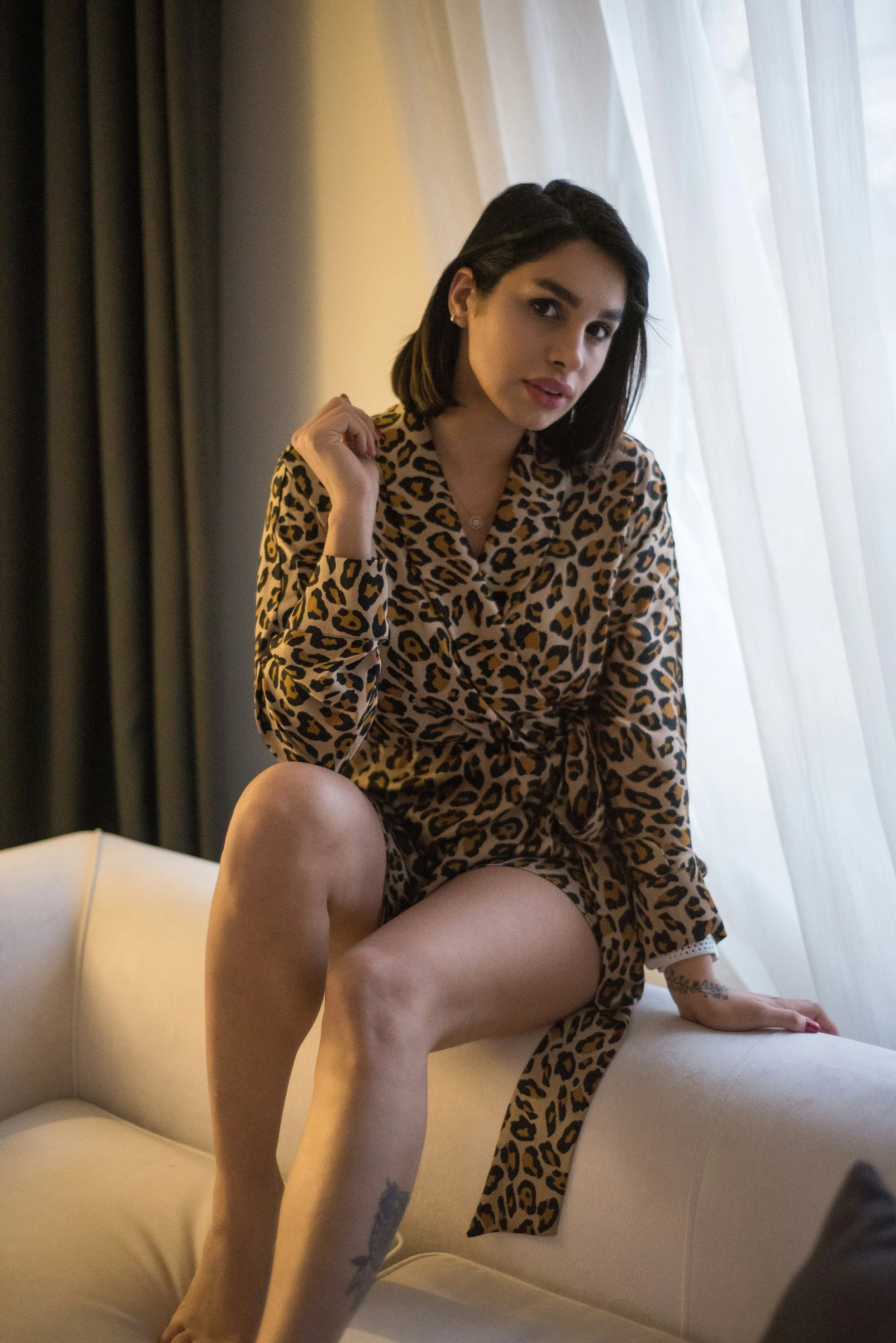 Woman wearing jaguar print dress