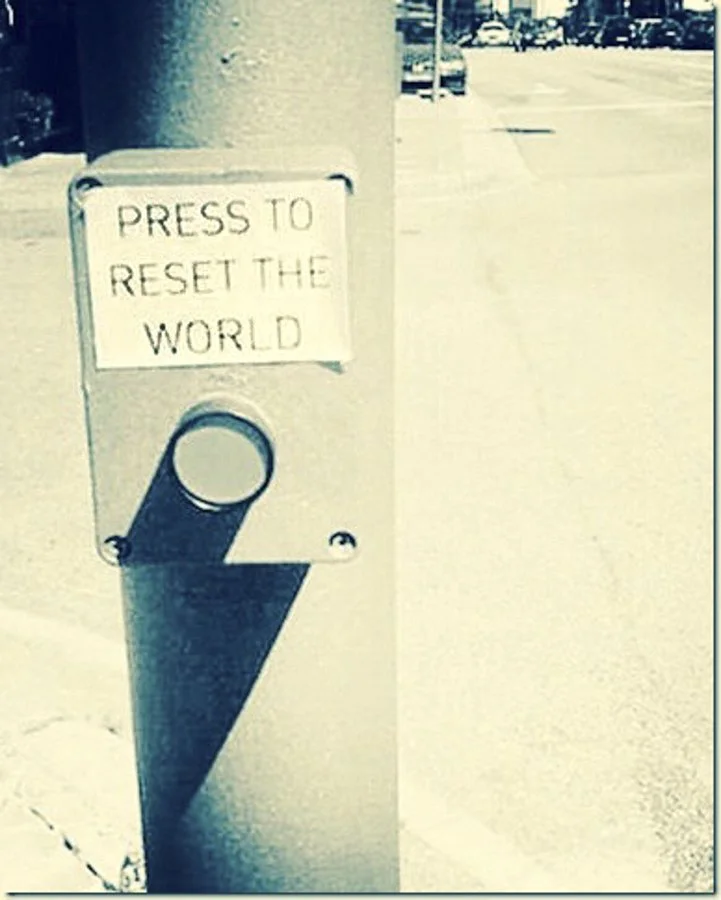 press to reset the world.jpg