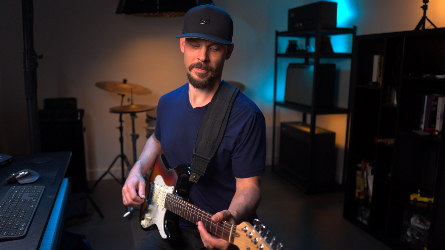 Garrett Ortego demonstrating guitar in his Scottsdale teaching studio