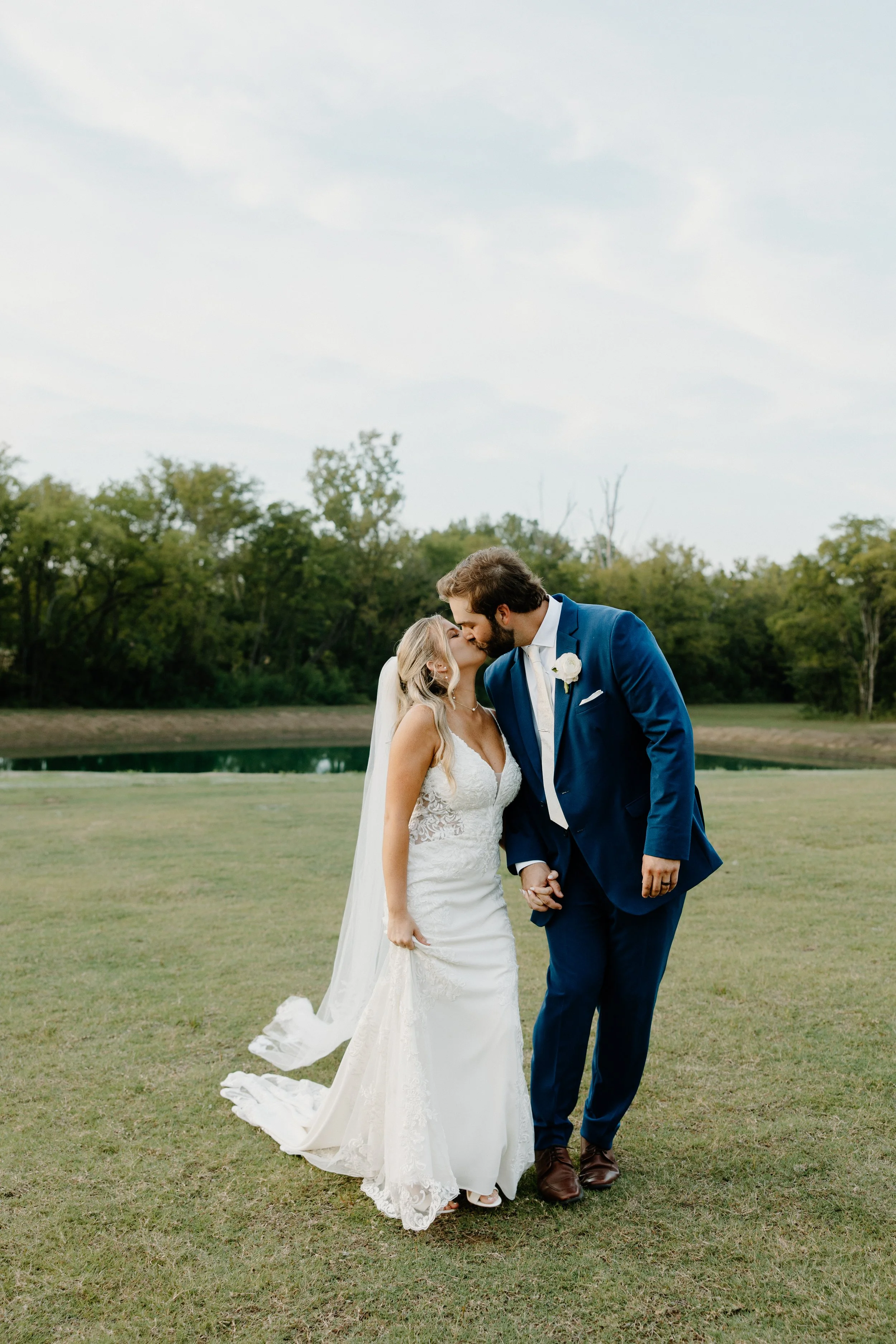 Bride and groom kissing at Tupelo's newest wedding venue, Bayleigh's Event and Wedding Venue. 