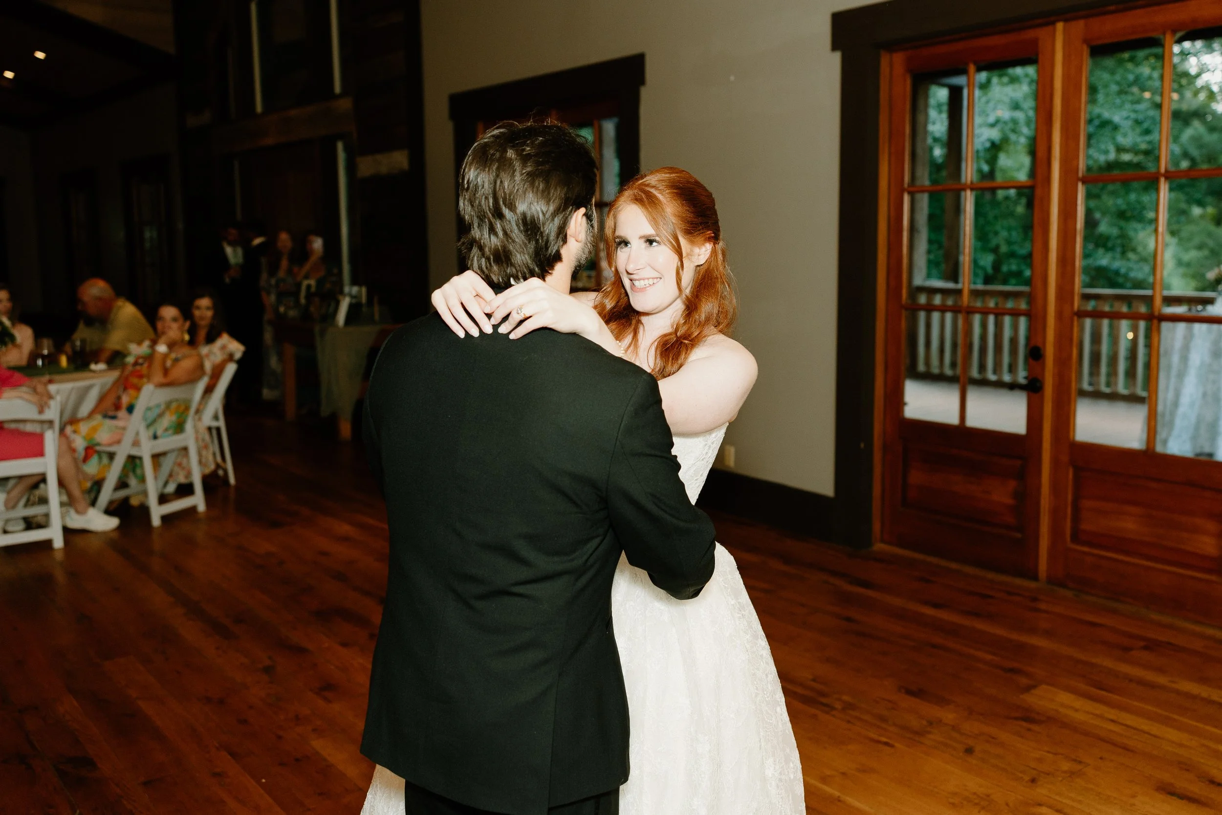 Reception shot of bride and groom first dance at Kingfisher Lodge