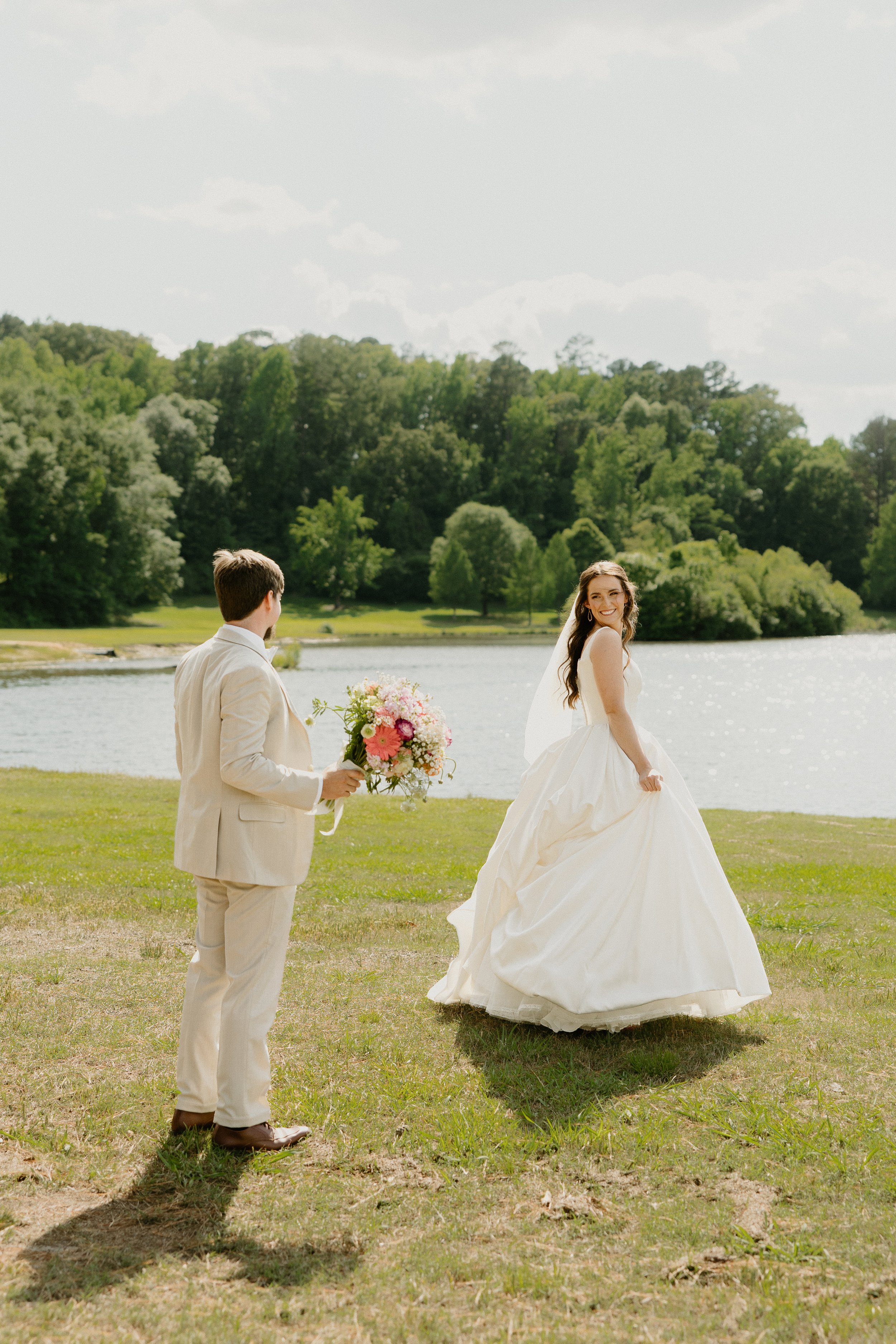 Tupelo Wedding Couple Running by Lake in Mississippi