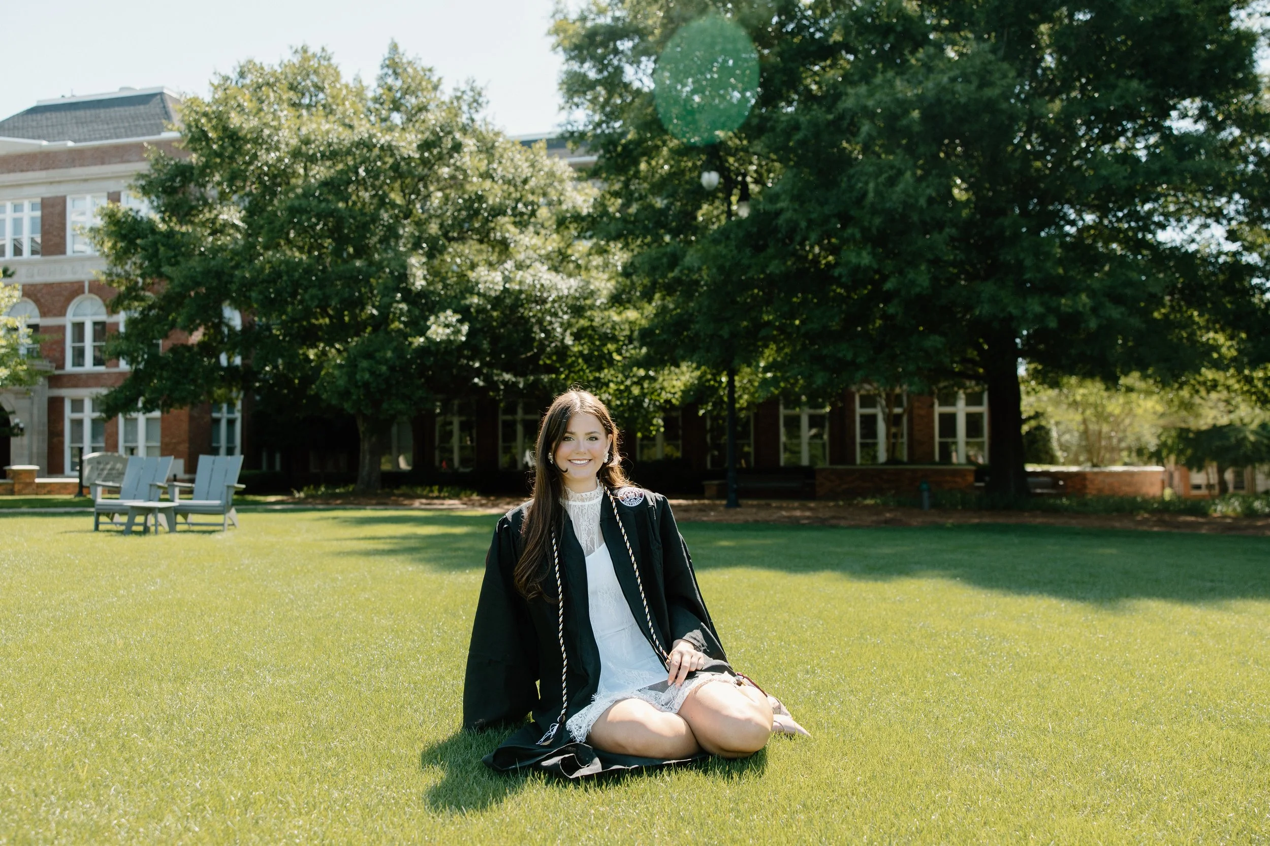 Mississippi State Starkvile Senior Sitting on Drill Field