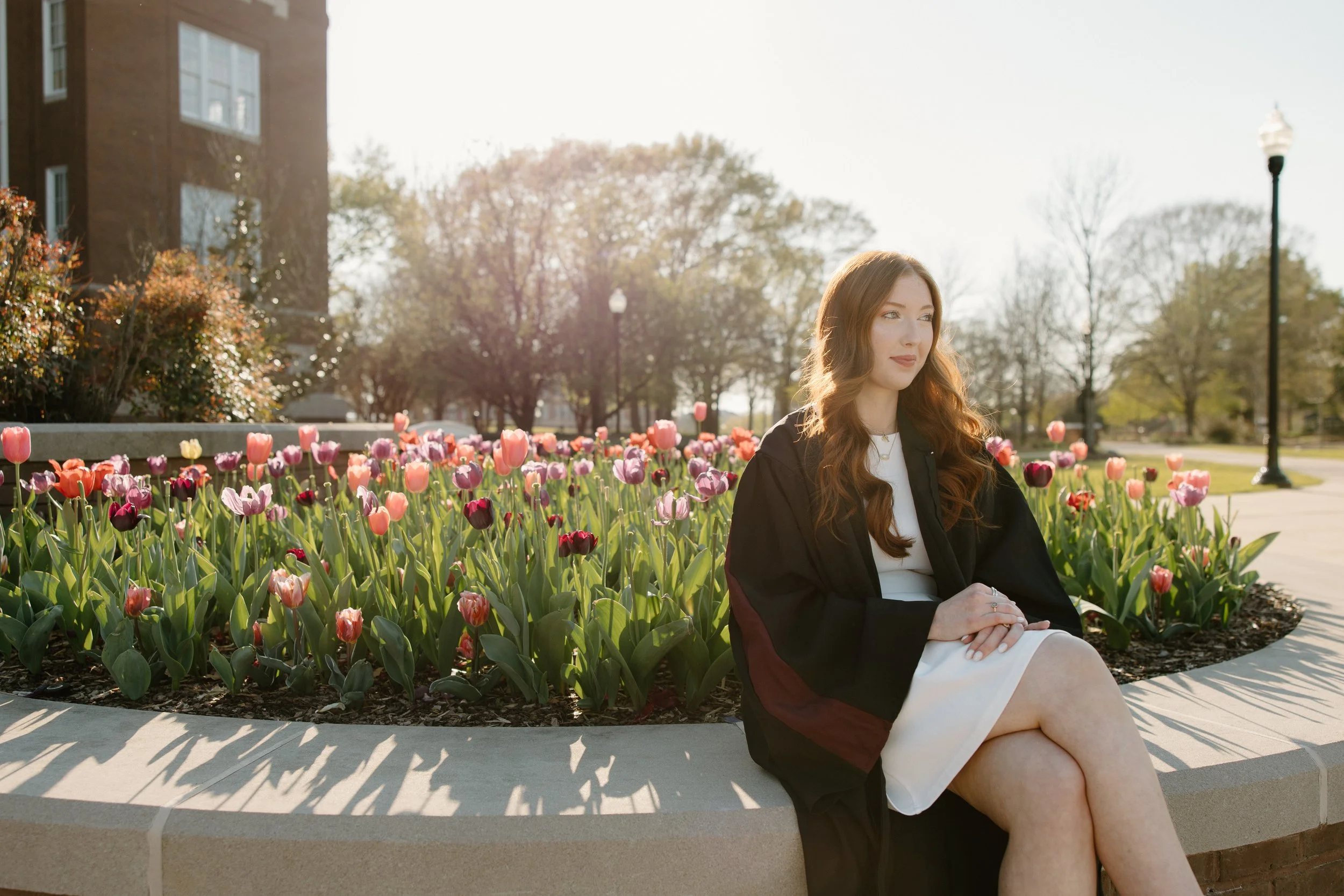 Starkville Mississippi Graduate with Tulips on Drill Field