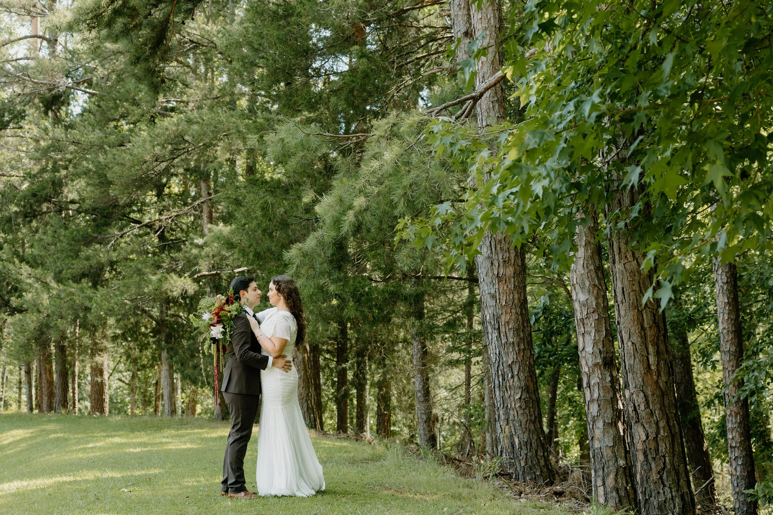 Husband and wife portraits near lake at Oxford airbnb