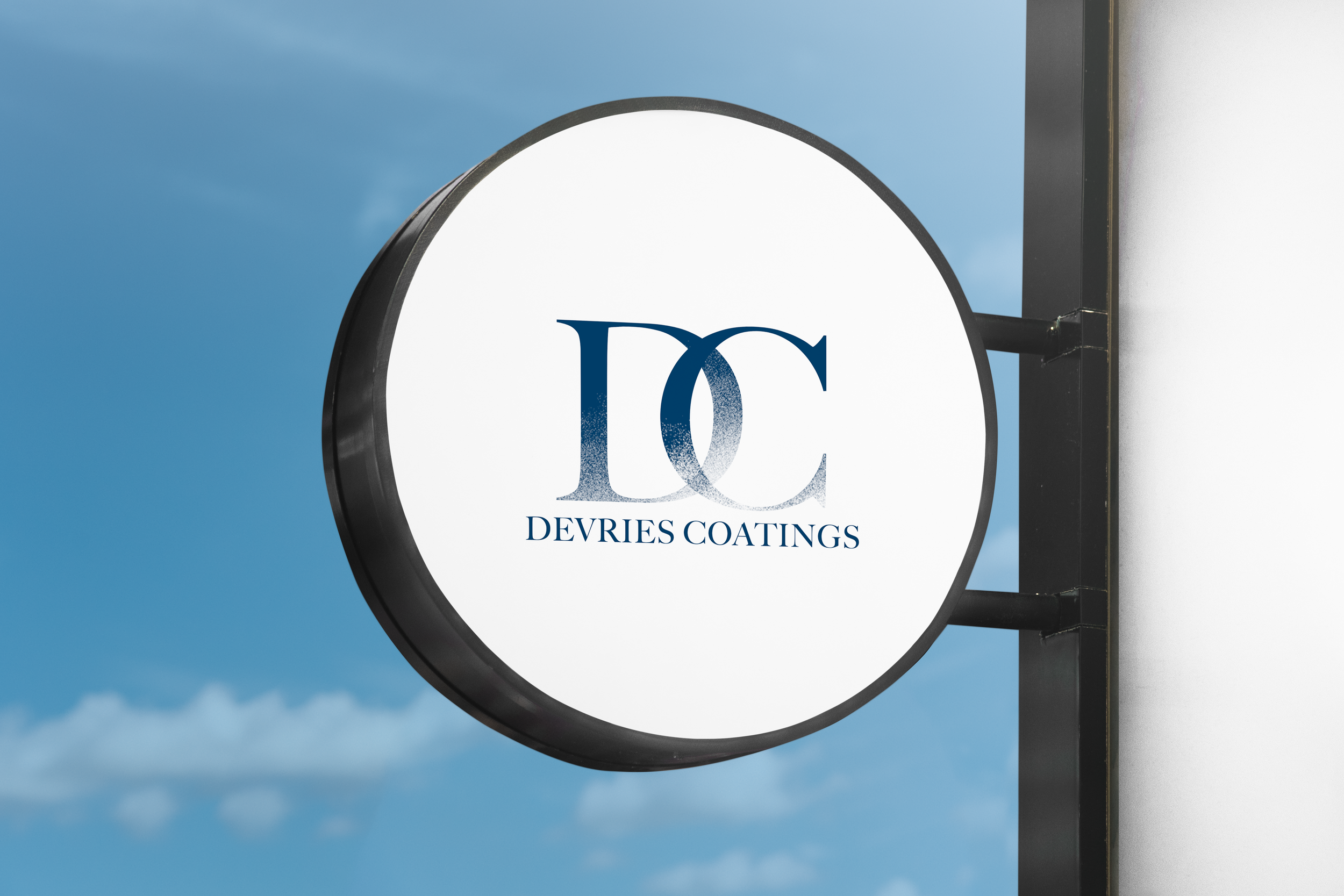 DeVries Coatings_sign mockup.png