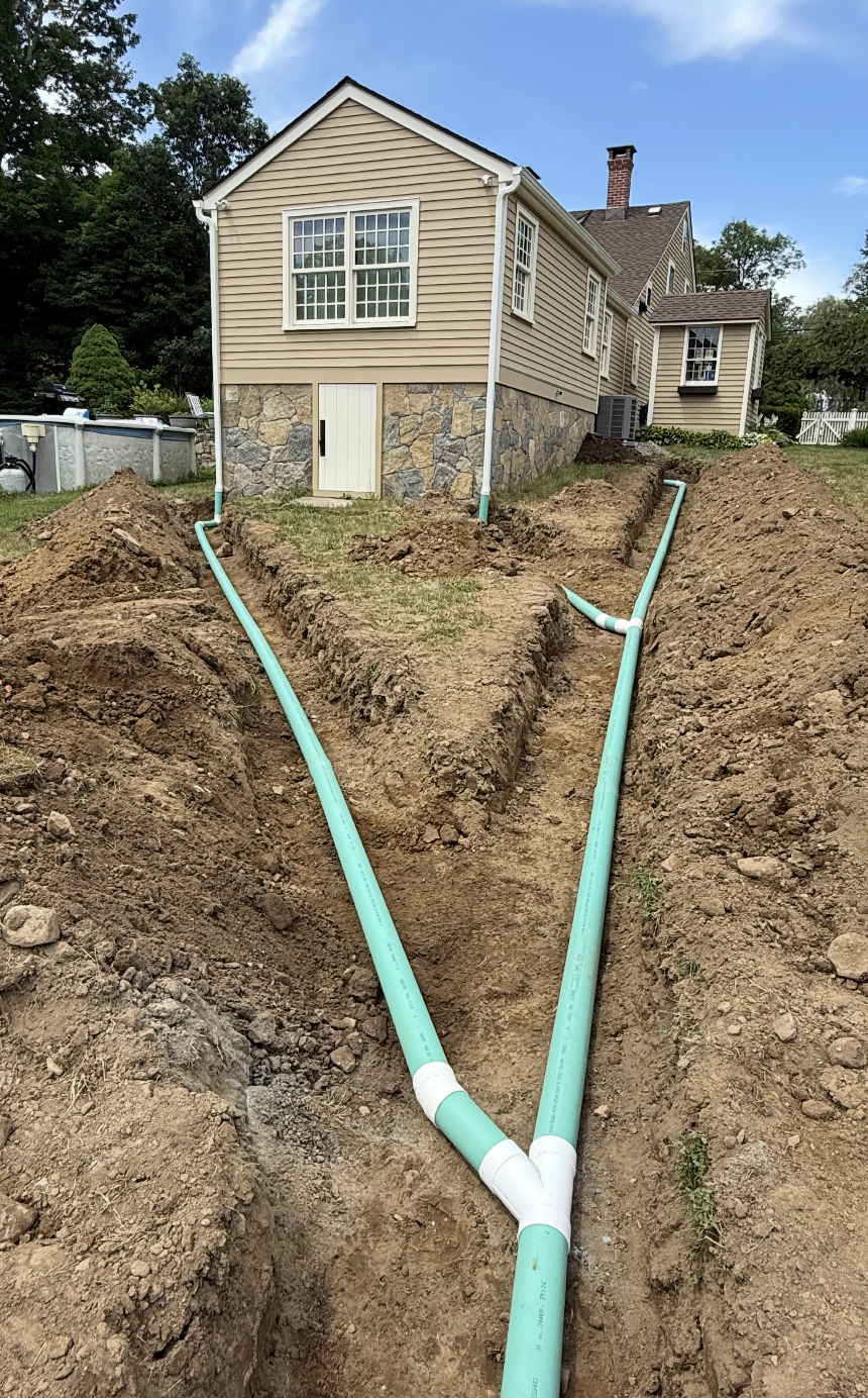 draining gutters away from house.png