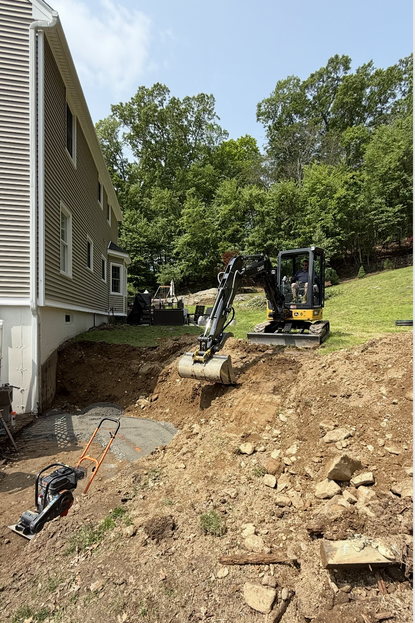 digging retaining wall.png