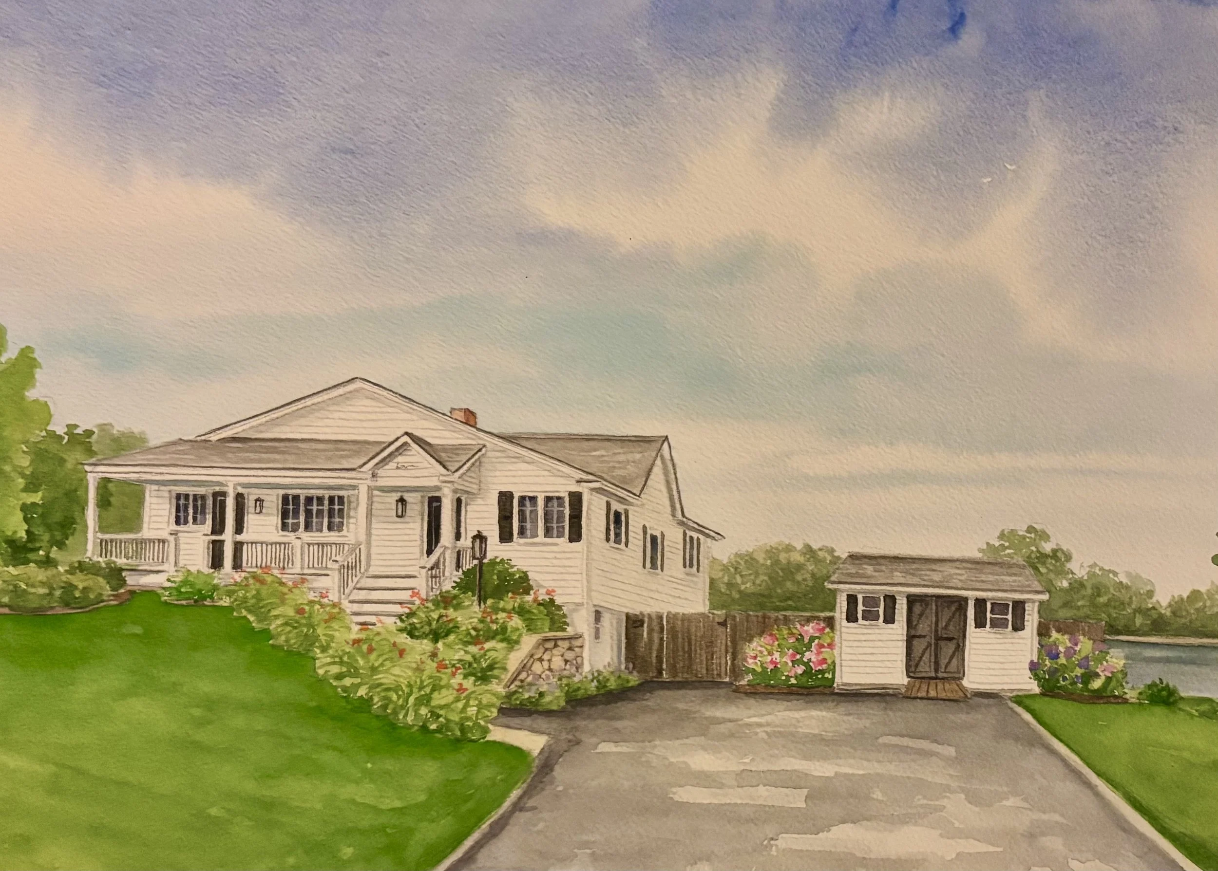 Watercolor painting of a two-story house with a porch, surrounded by green grass and trees, under a sky with clouds.
