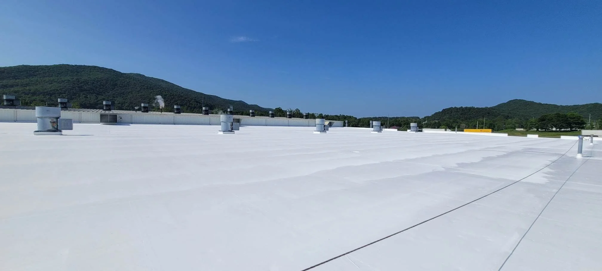 Fabric Reinforced Membrane Roofing by Scenic Commercial Roofing